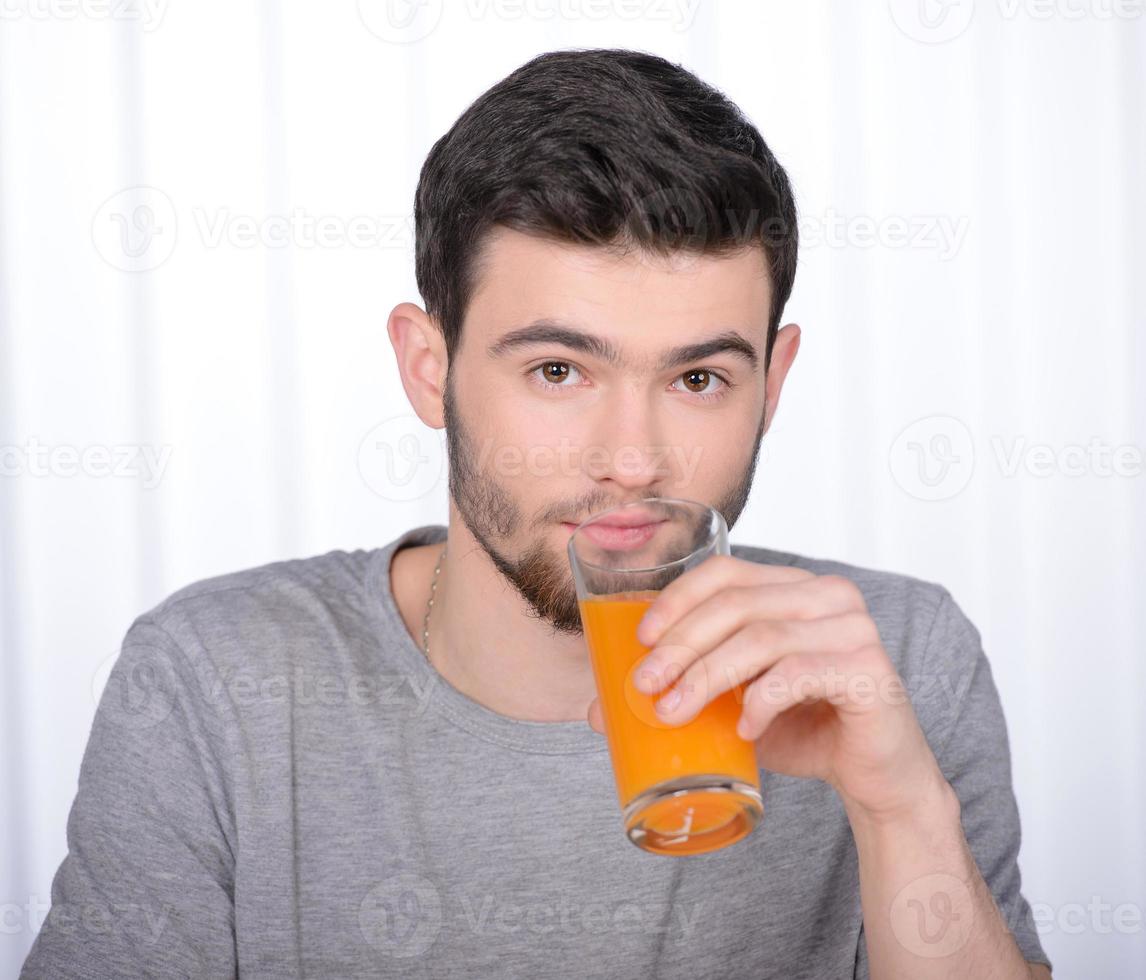 Man Drinking Juice 936885 Stock Photo at Vecteezy