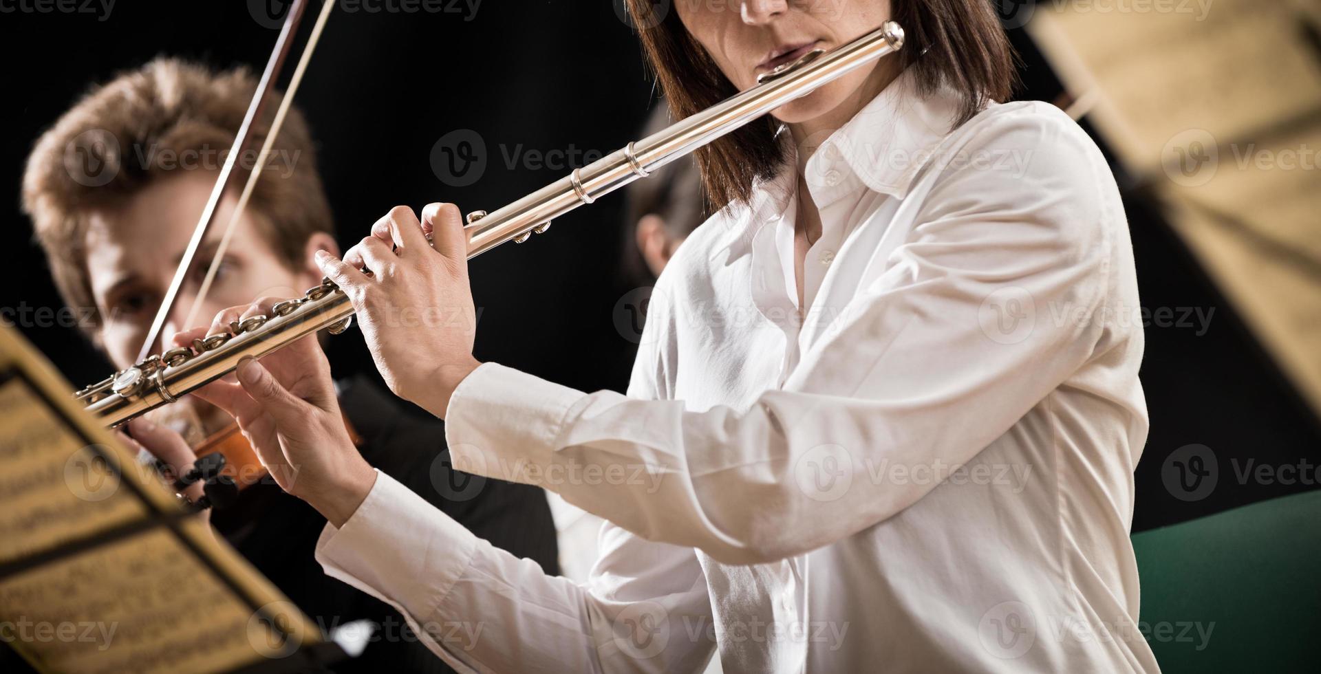 Flutist on stage photo