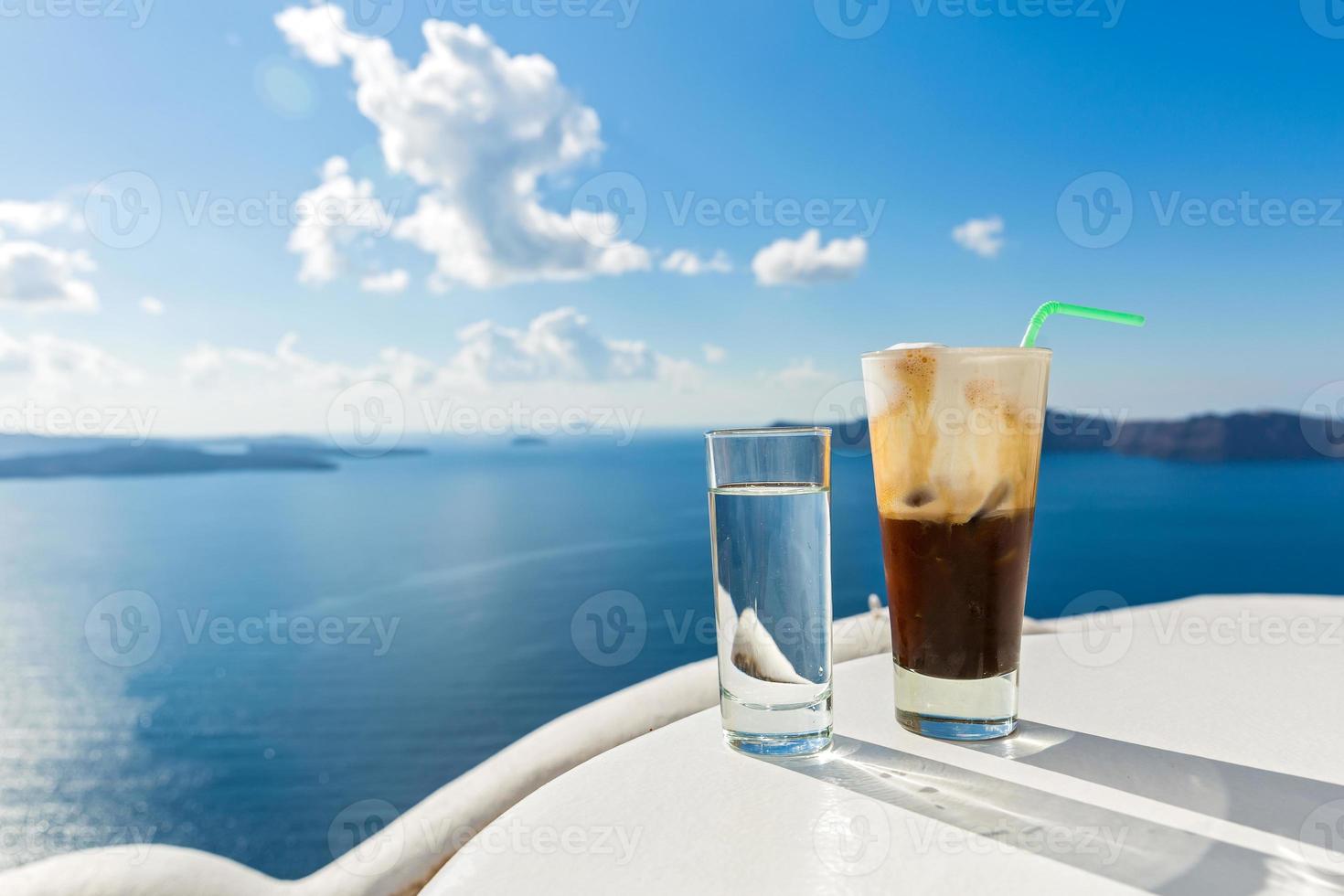 Refreshing drink near the sea photo