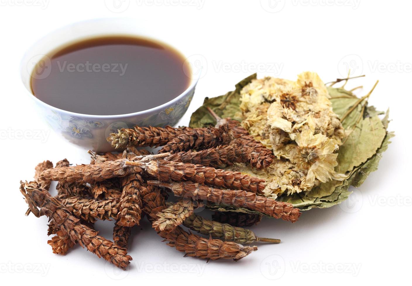 Chinese herbal medicine with drink photo