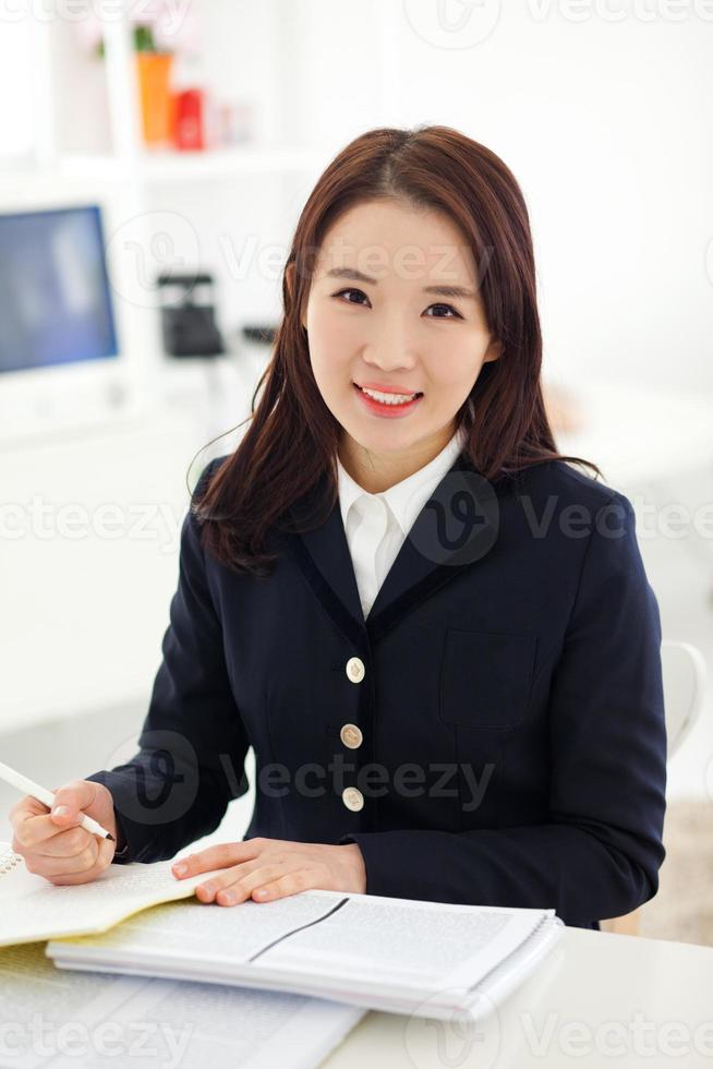 Yong pretty Asian student studying photo