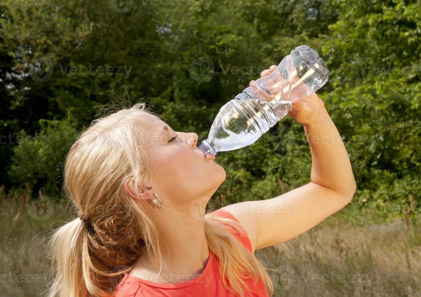 woman drinking water photo