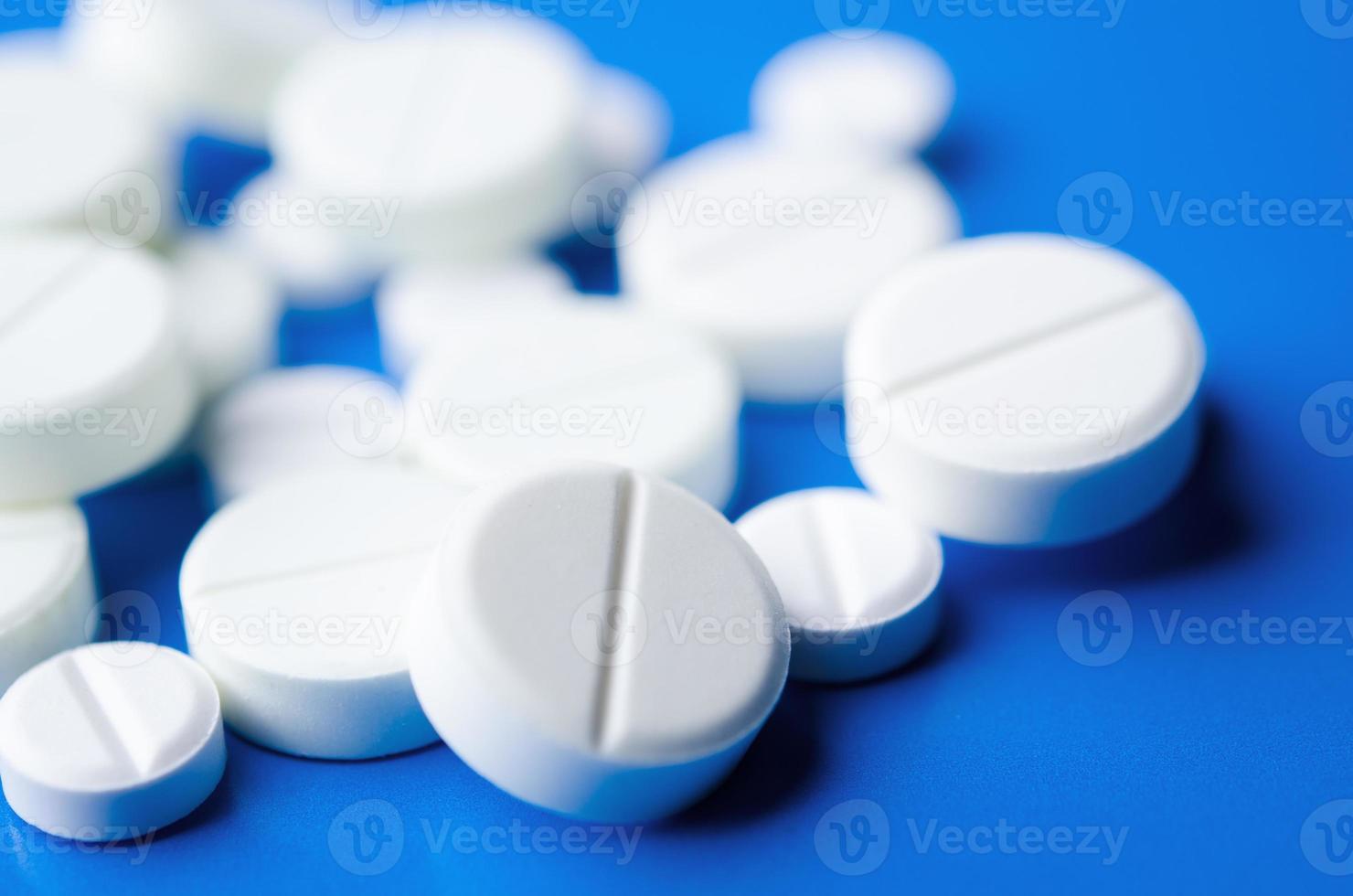 closeup of white pills photo
