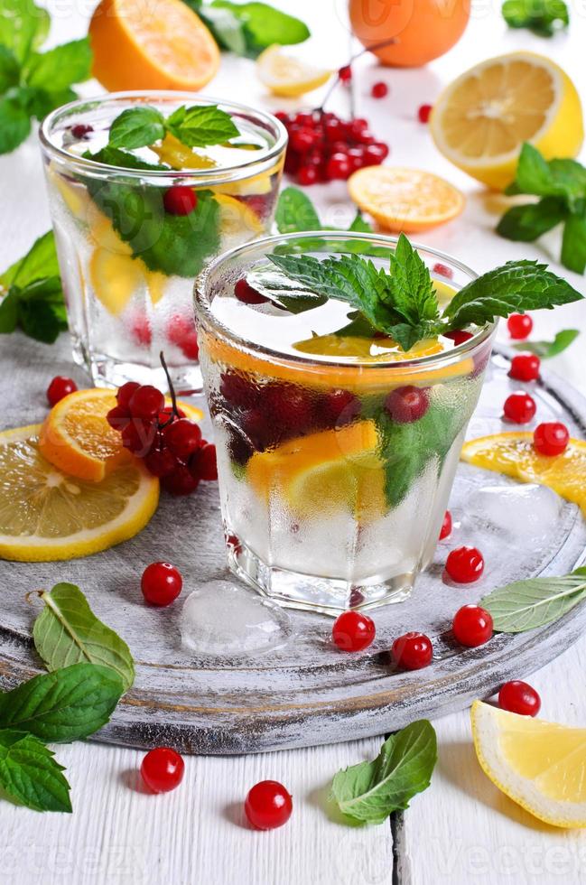 Drink with citrus and berries photo