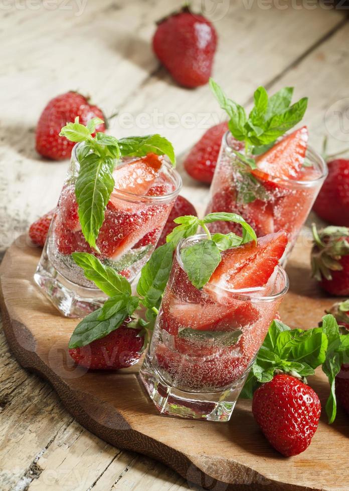 Refreshing strawberry drink with mint photo
