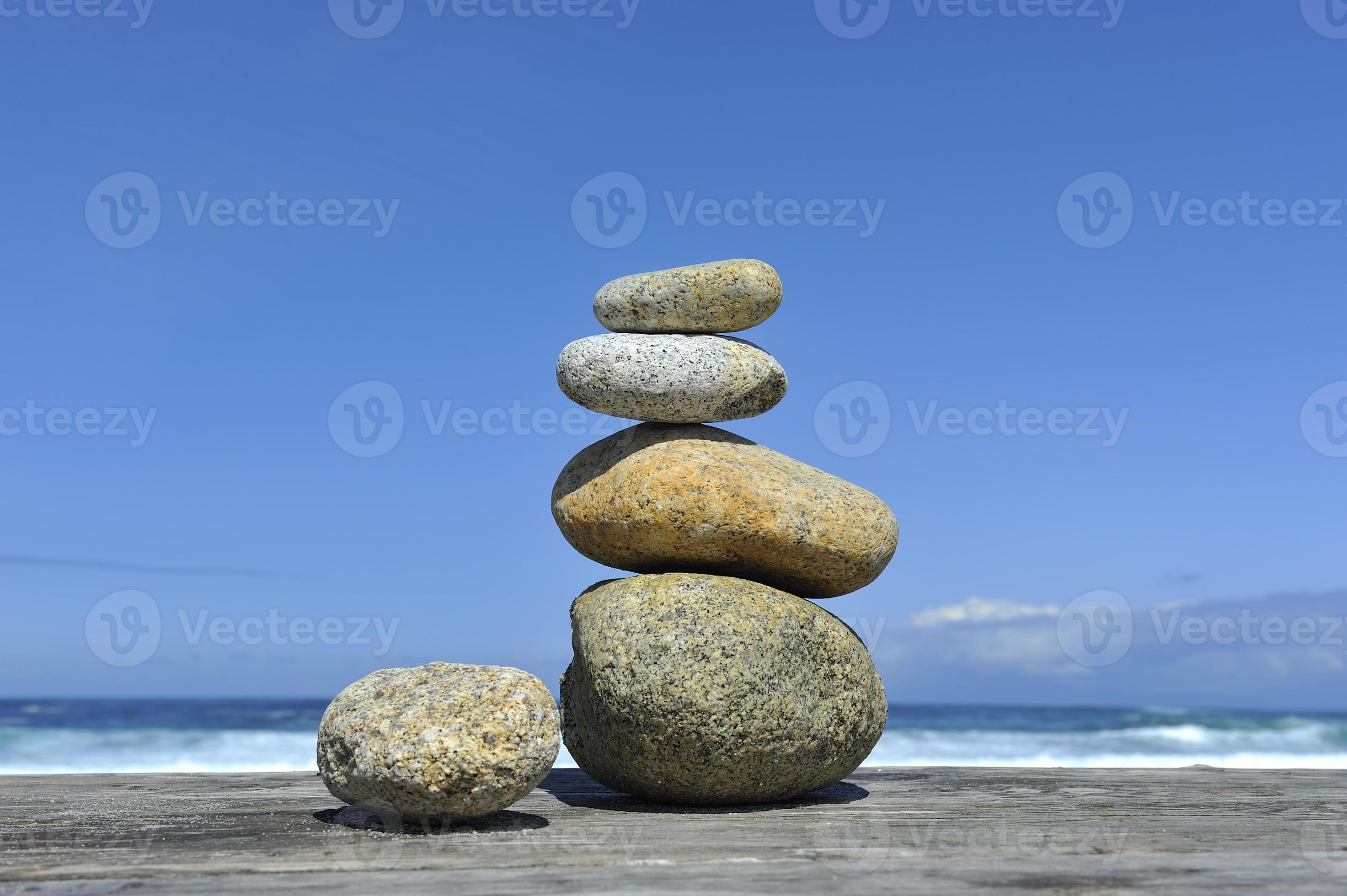 Zen Stones Stacked At Beach Waves Blue Sky Copy Space Stock Photo Zen Stones Stacked At Beach Waves Blue Sky Copy Space Stock Photo