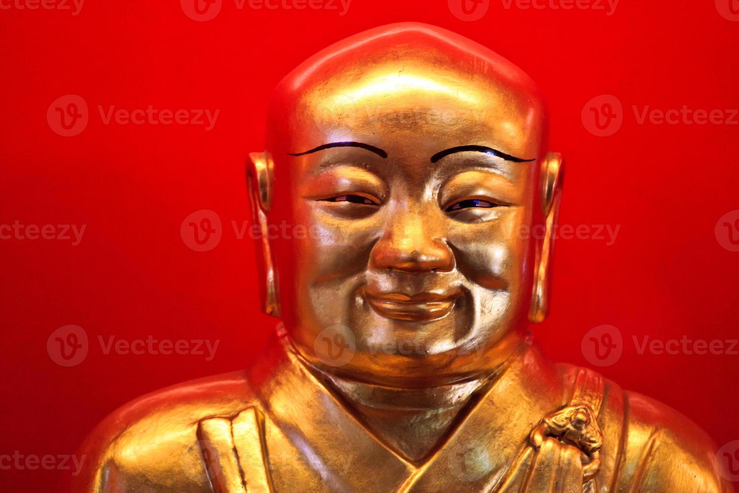 beautiful face of Buddha image photo
