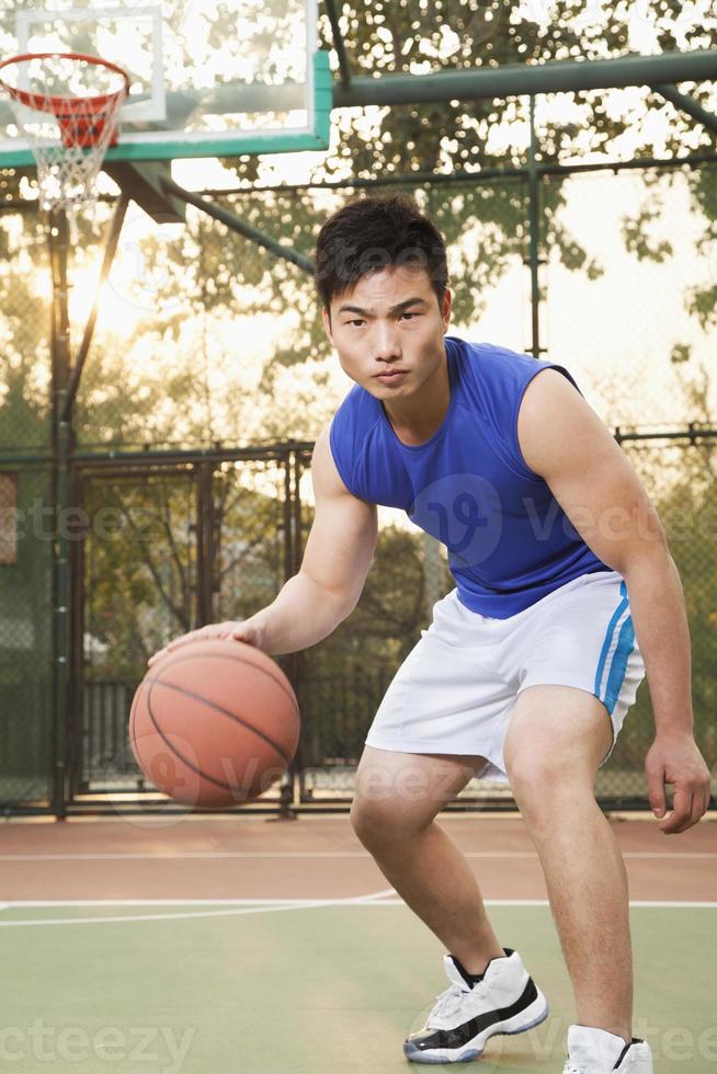 Street basketball player on the court, portrait photo