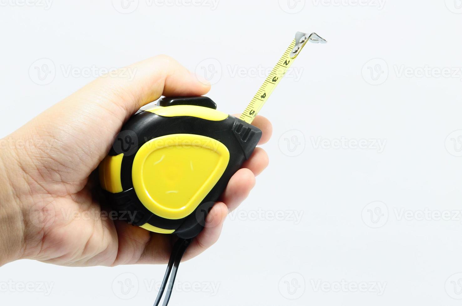 Human hand with tape measure photo