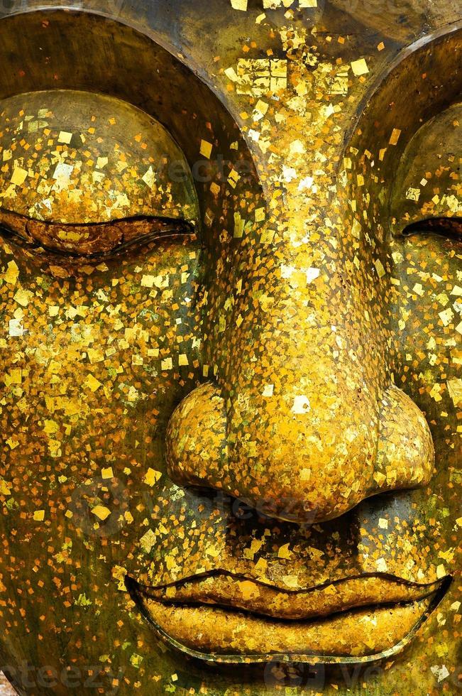 el rostro de Buda de bronce foto