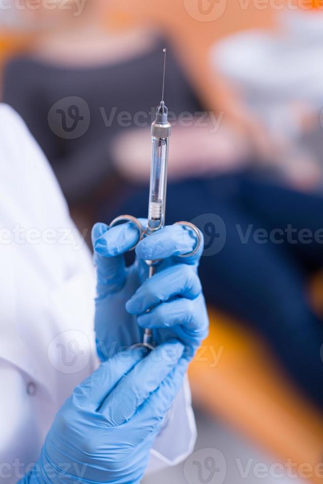 Close-up of syringe photo