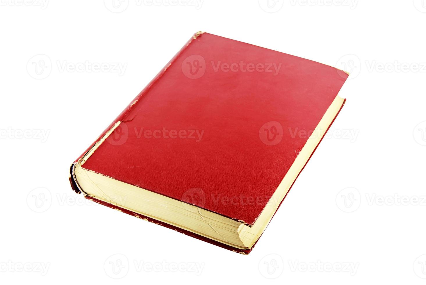 viejo libro rojo aislado en blanco foto