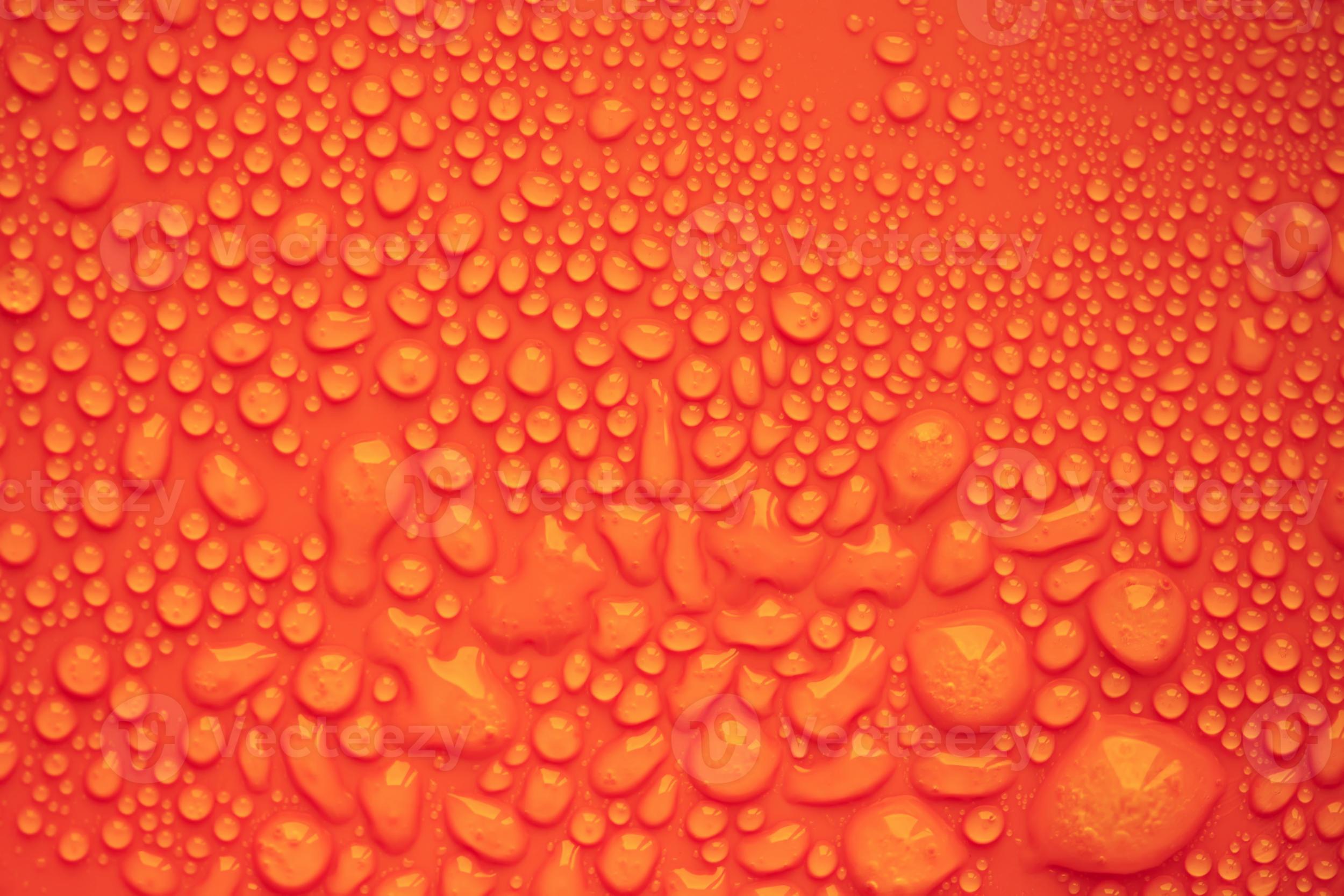 Water drops. Orange background. 956847 Stock Photo at Vecteezy