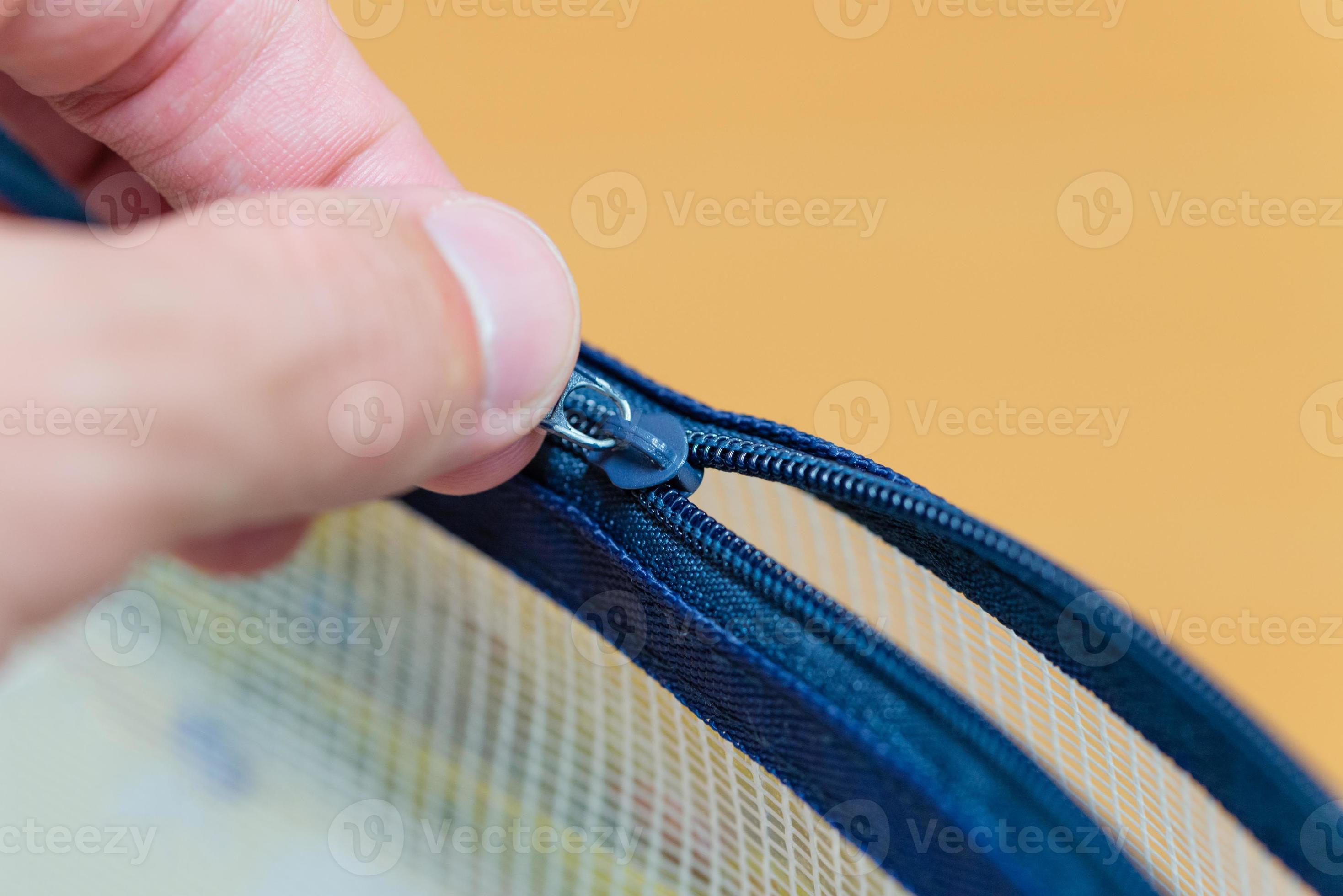 Pulling Zipper 965181 Stock Photo at Vecteezy