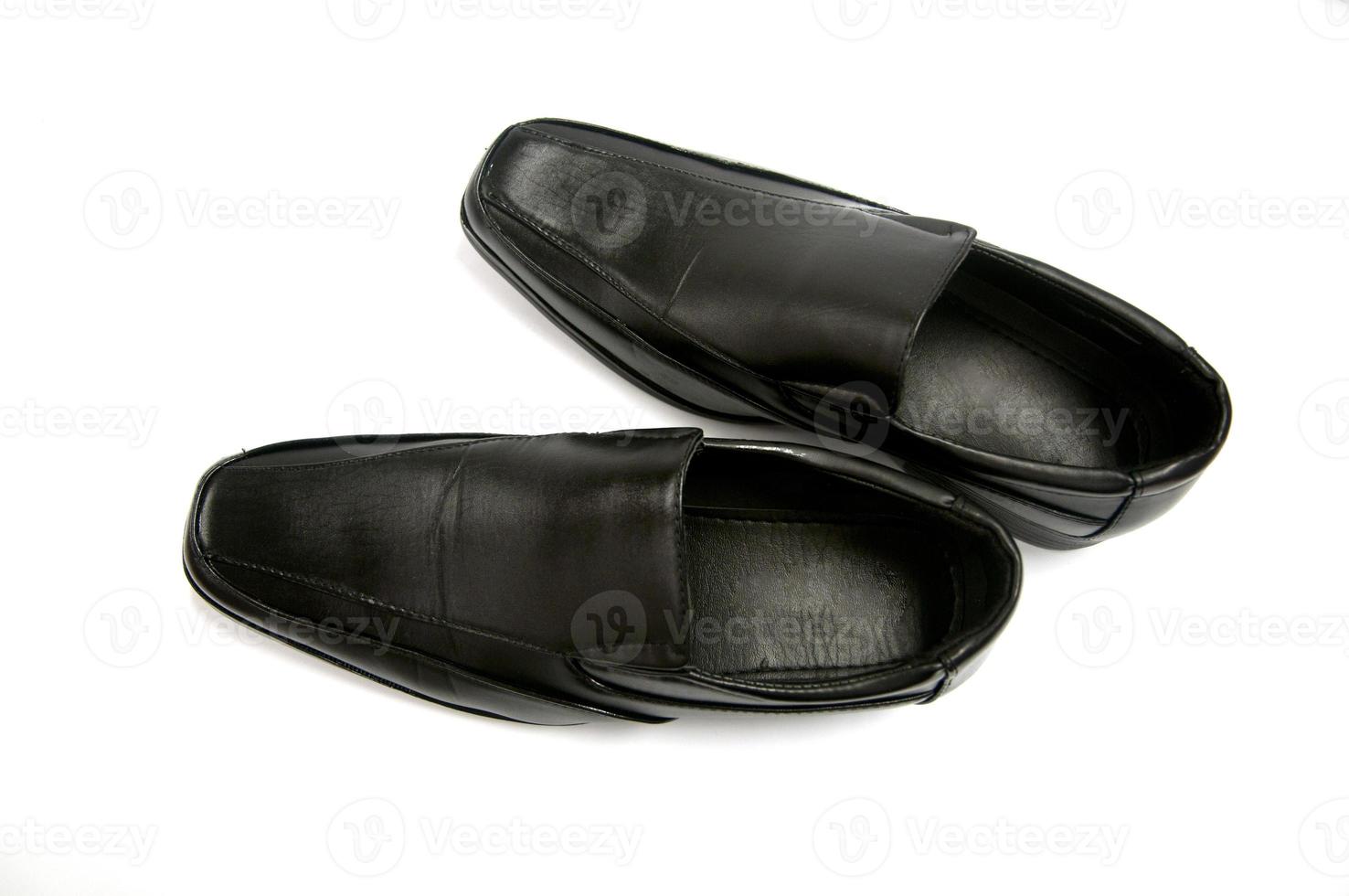 Black glossy man shoe isolated on white background photo