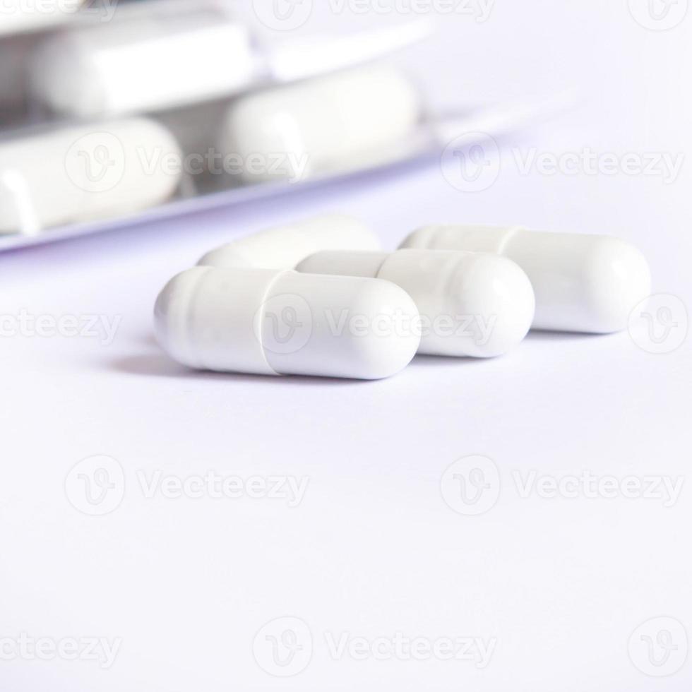 White capsules medicine photo
