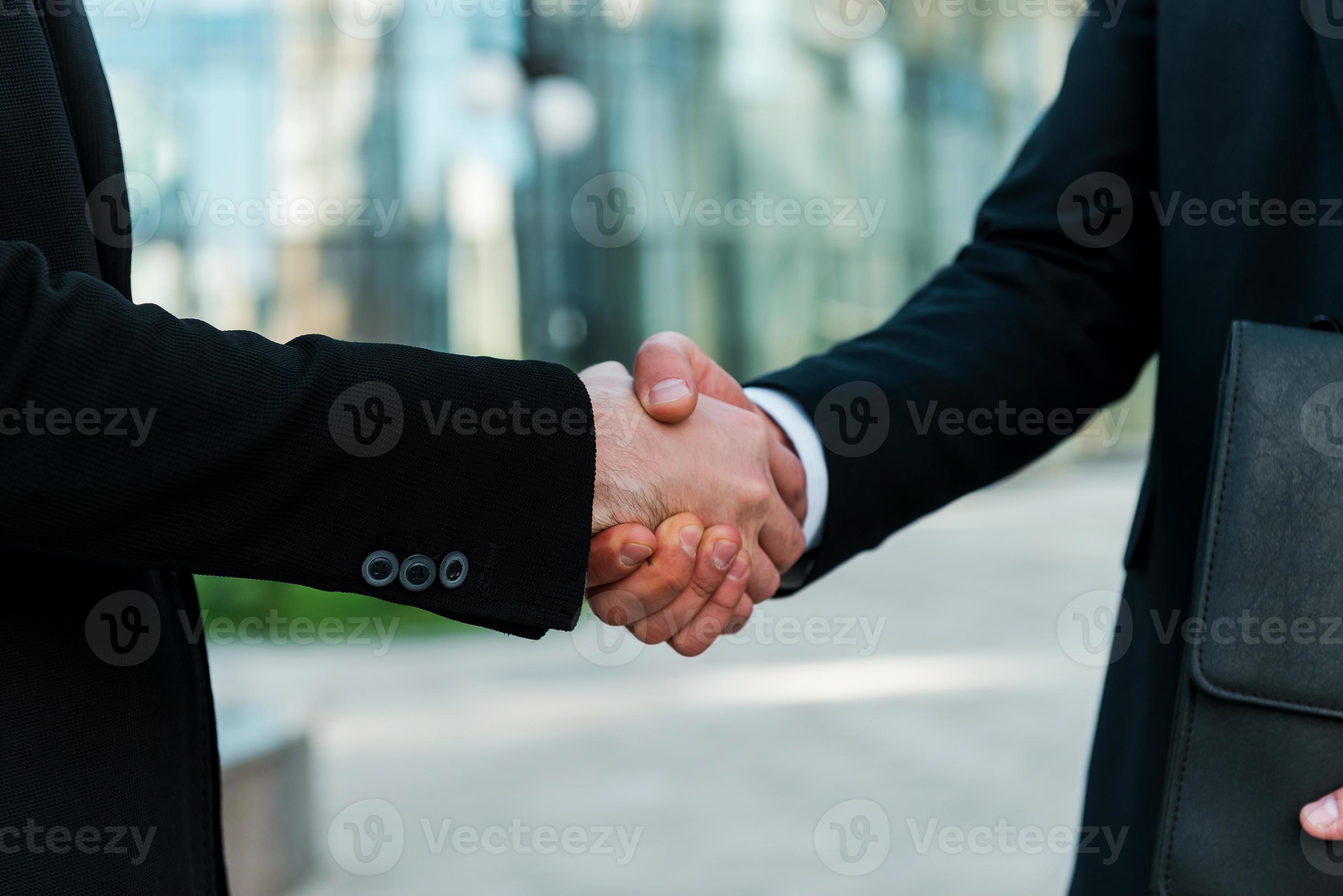 Sealing a deal. 990743 Stock Photo at Vecteezy