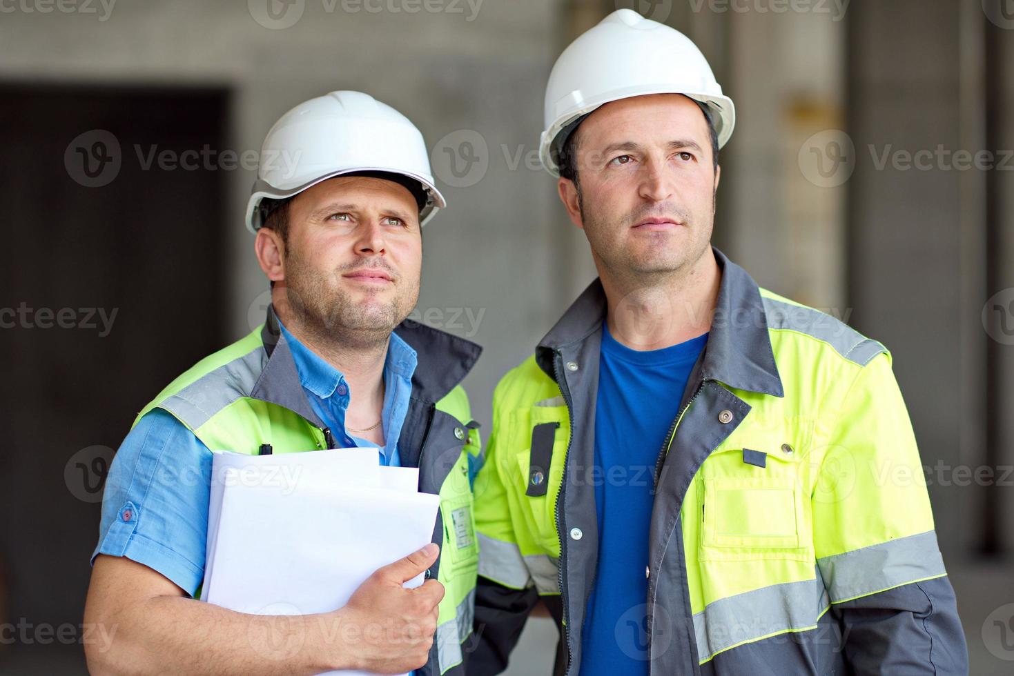 Civil Engineers At Construction Site photo