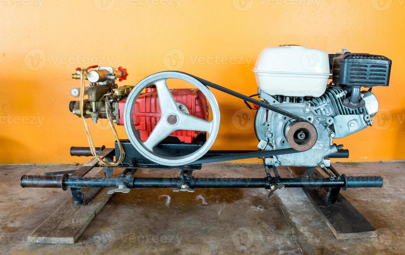 Engine of Long Tail Motor Boat waiting for repair photo