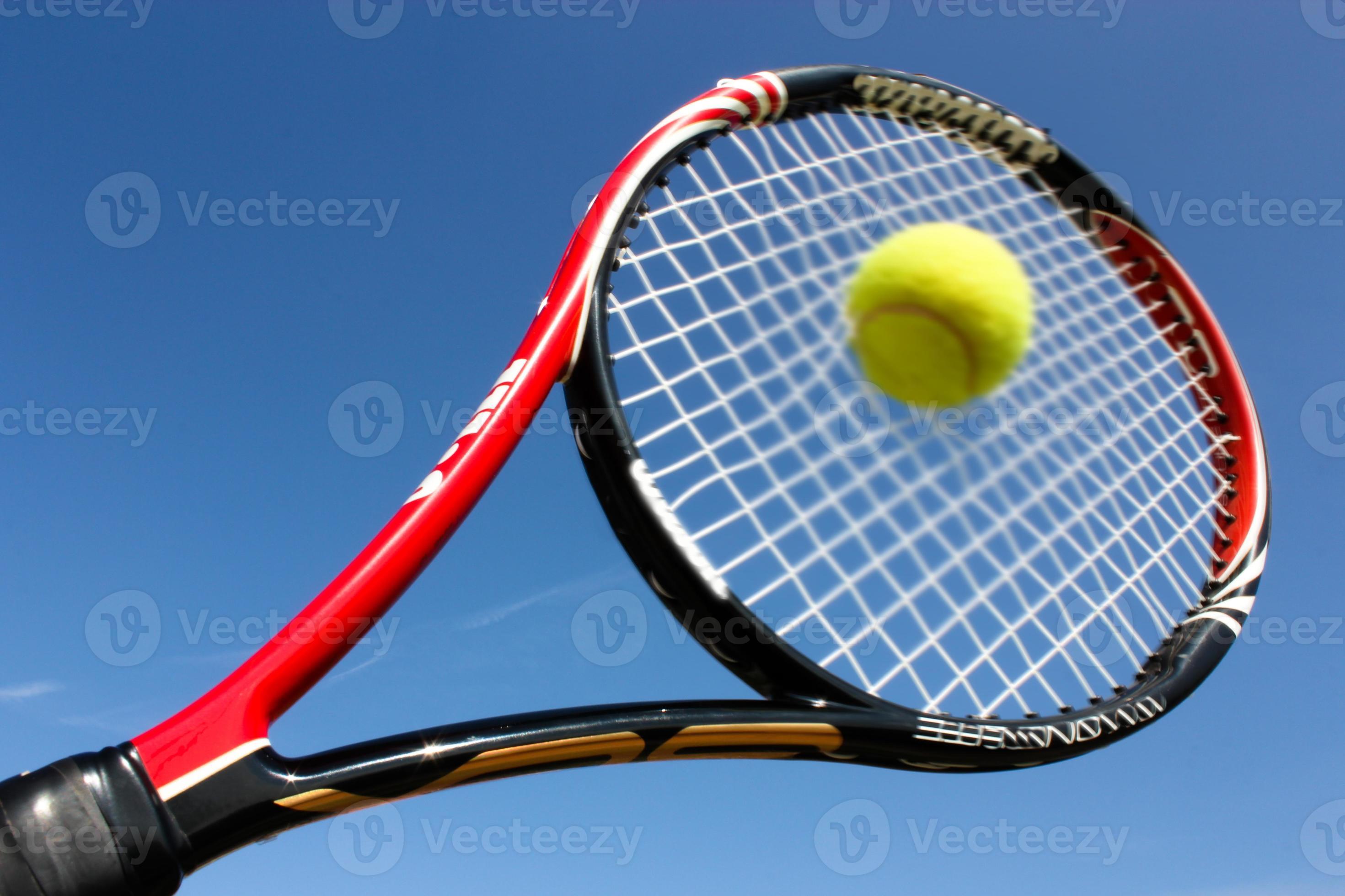 Tennis racket hitting the ball 991976 Stock Photo at Vecteezy