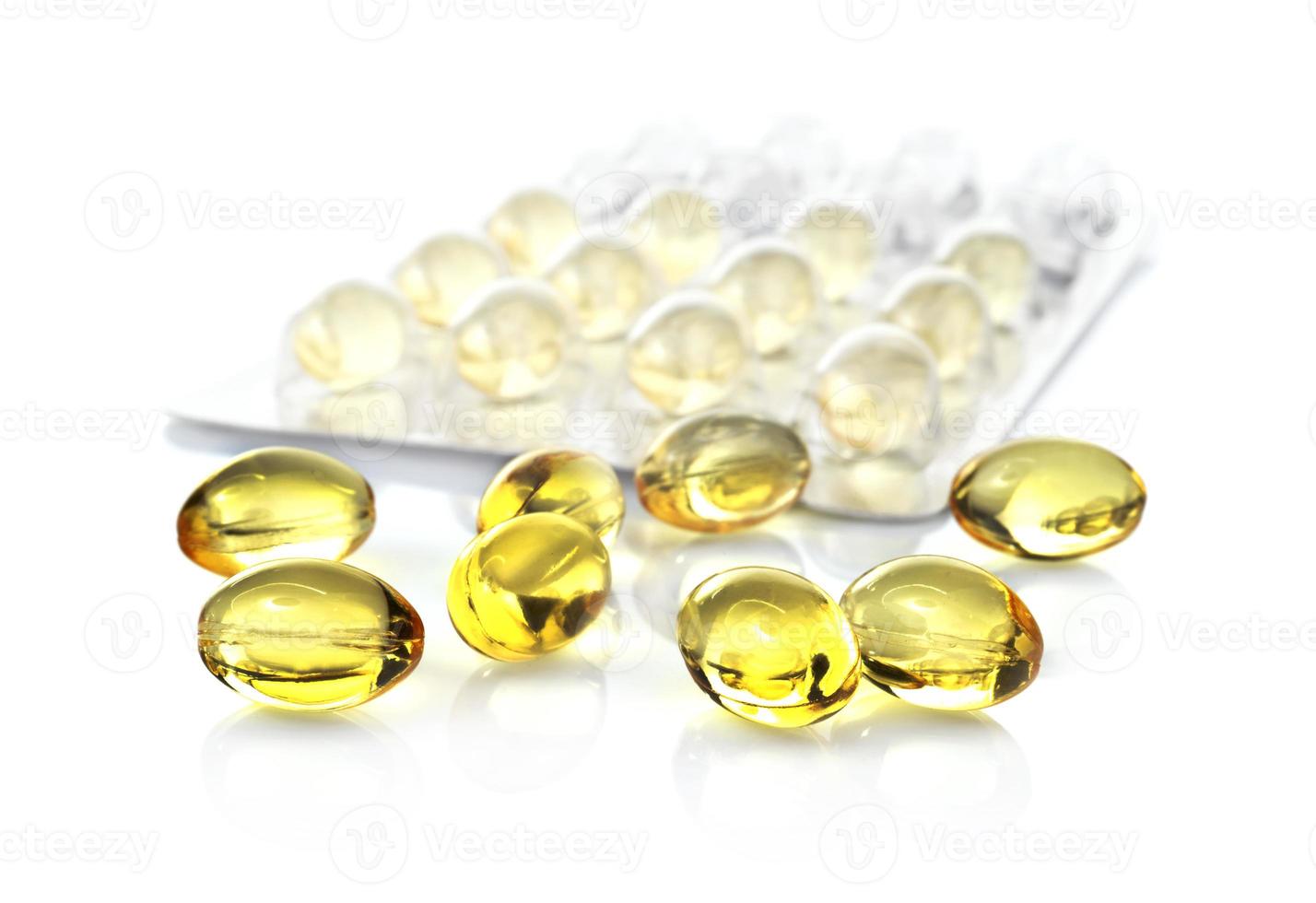 fish oil capsules and blister pack isolated on white background photo