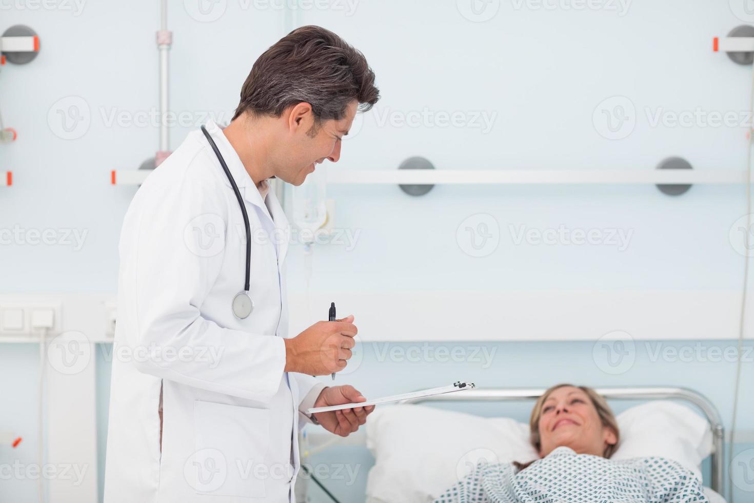 Doctor speaking with his patient photo