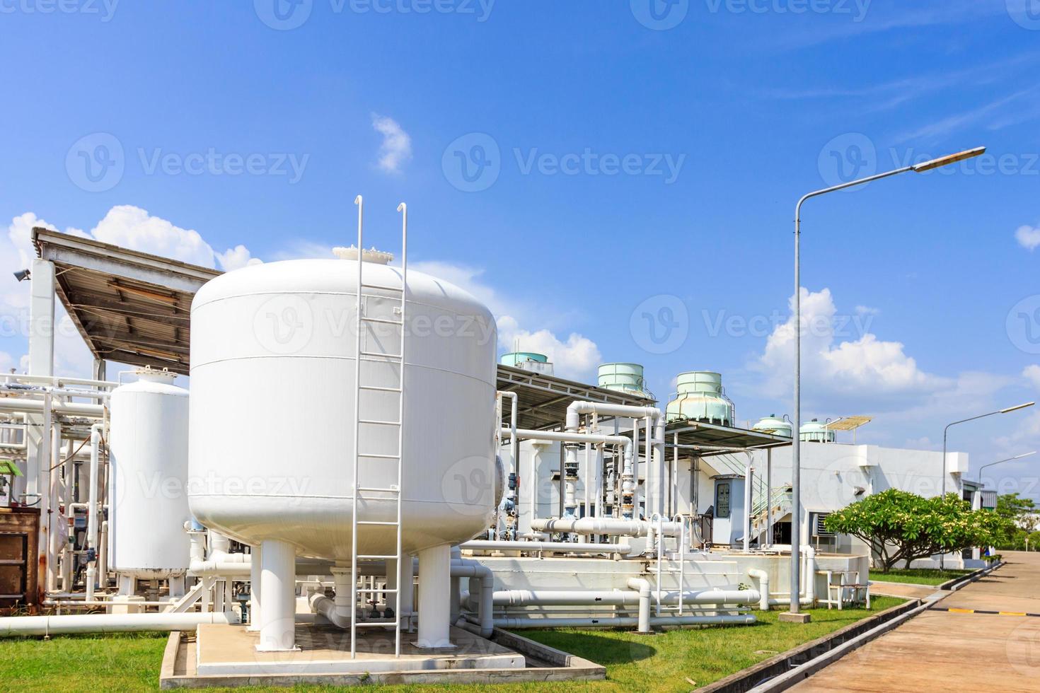 chemistry tank in factory with blue sky photo