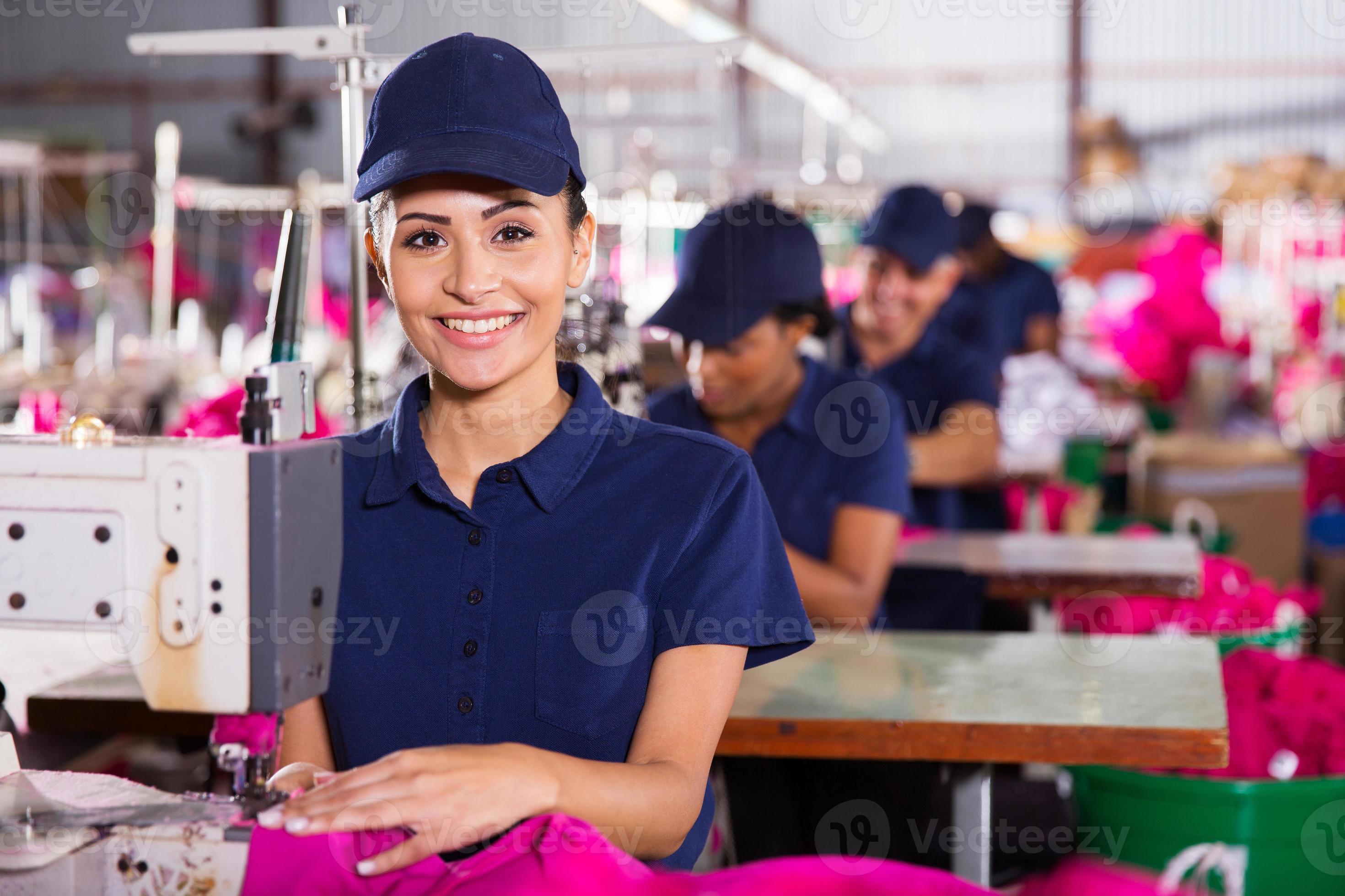 young textile machinist using sewing machine 1014574 Stock Photo at