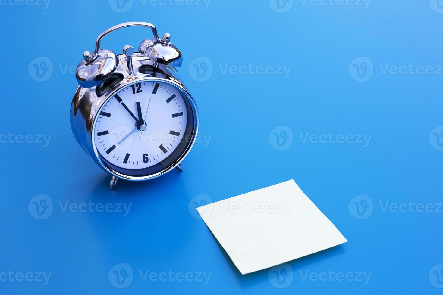 alarm clock with stocky note photo