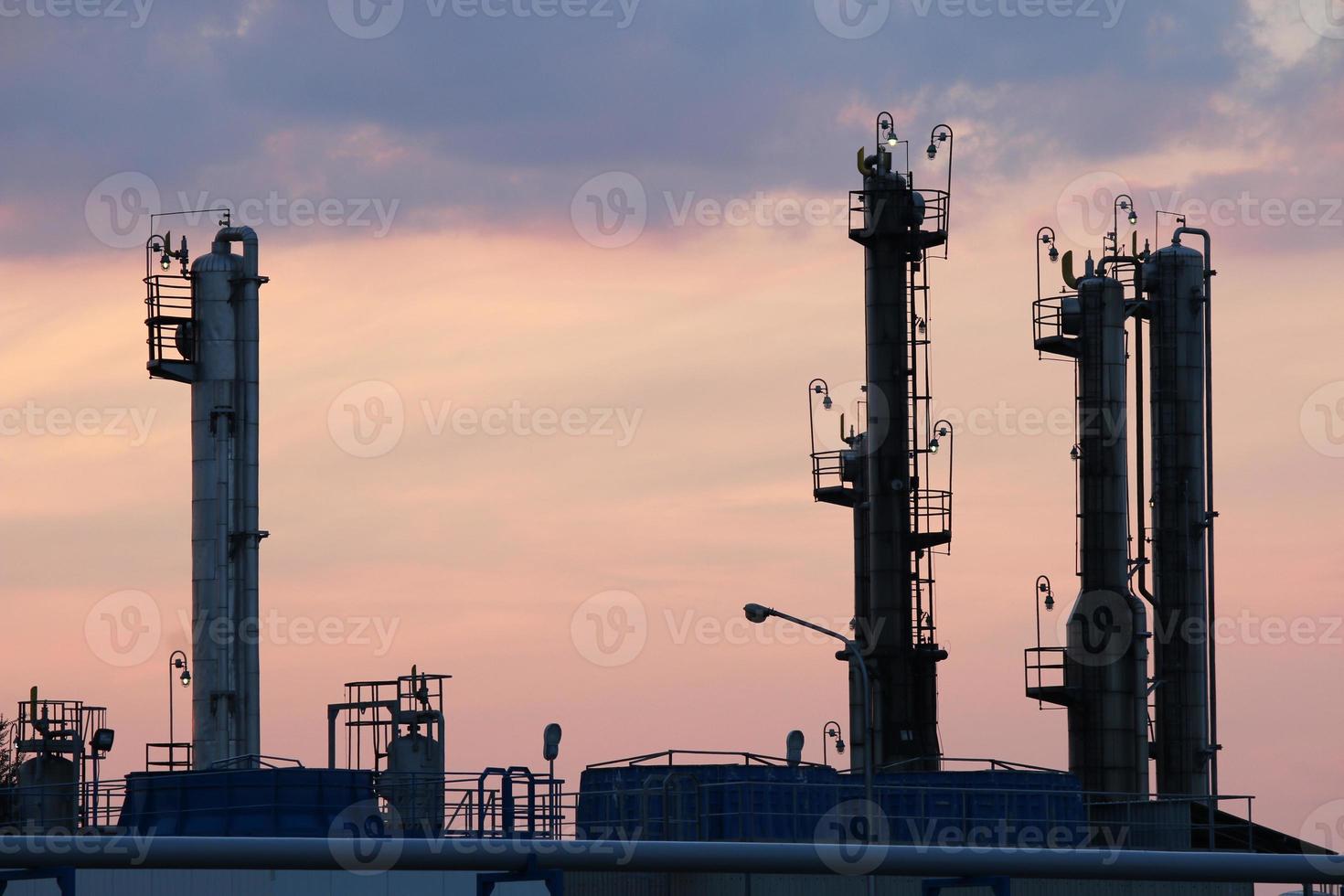 twilight over petrochemical plant photo