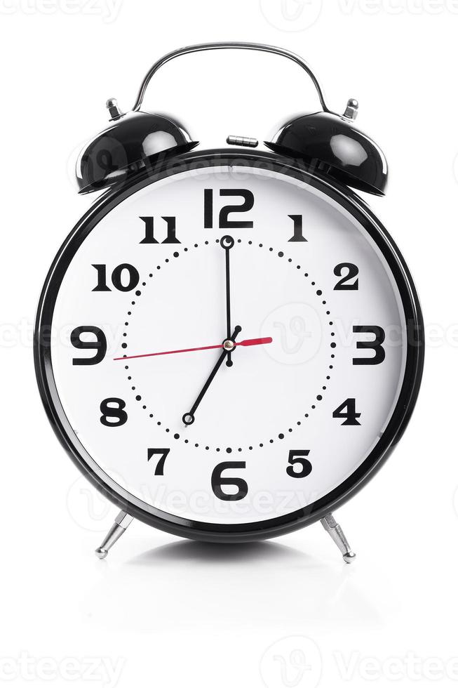 Time for work Alarm Clock Shows Seven o`clock 1109017 Stock Photo at Vecteezy