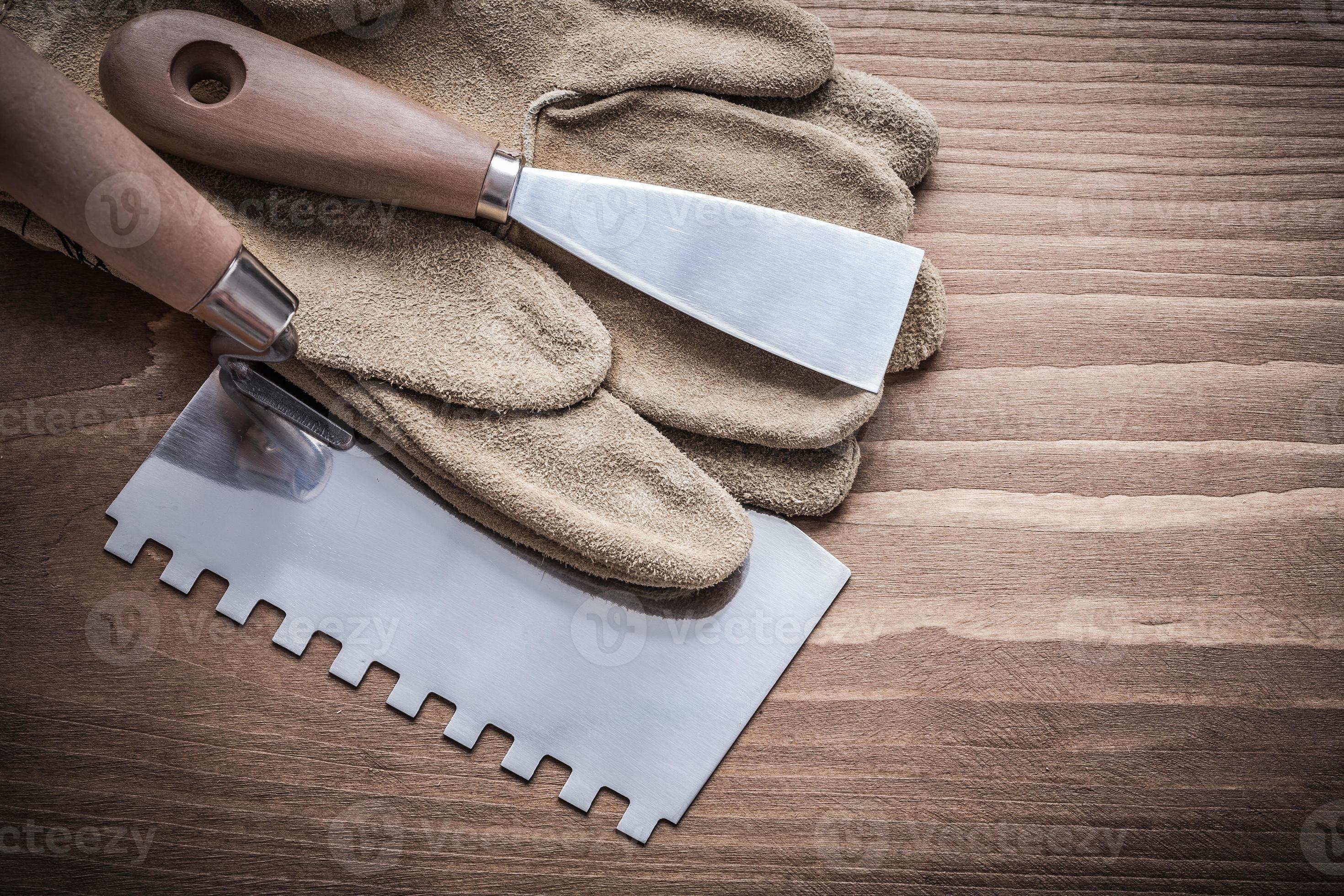 paint scraper and putty knife with working glove 1112355 Stock Photo at