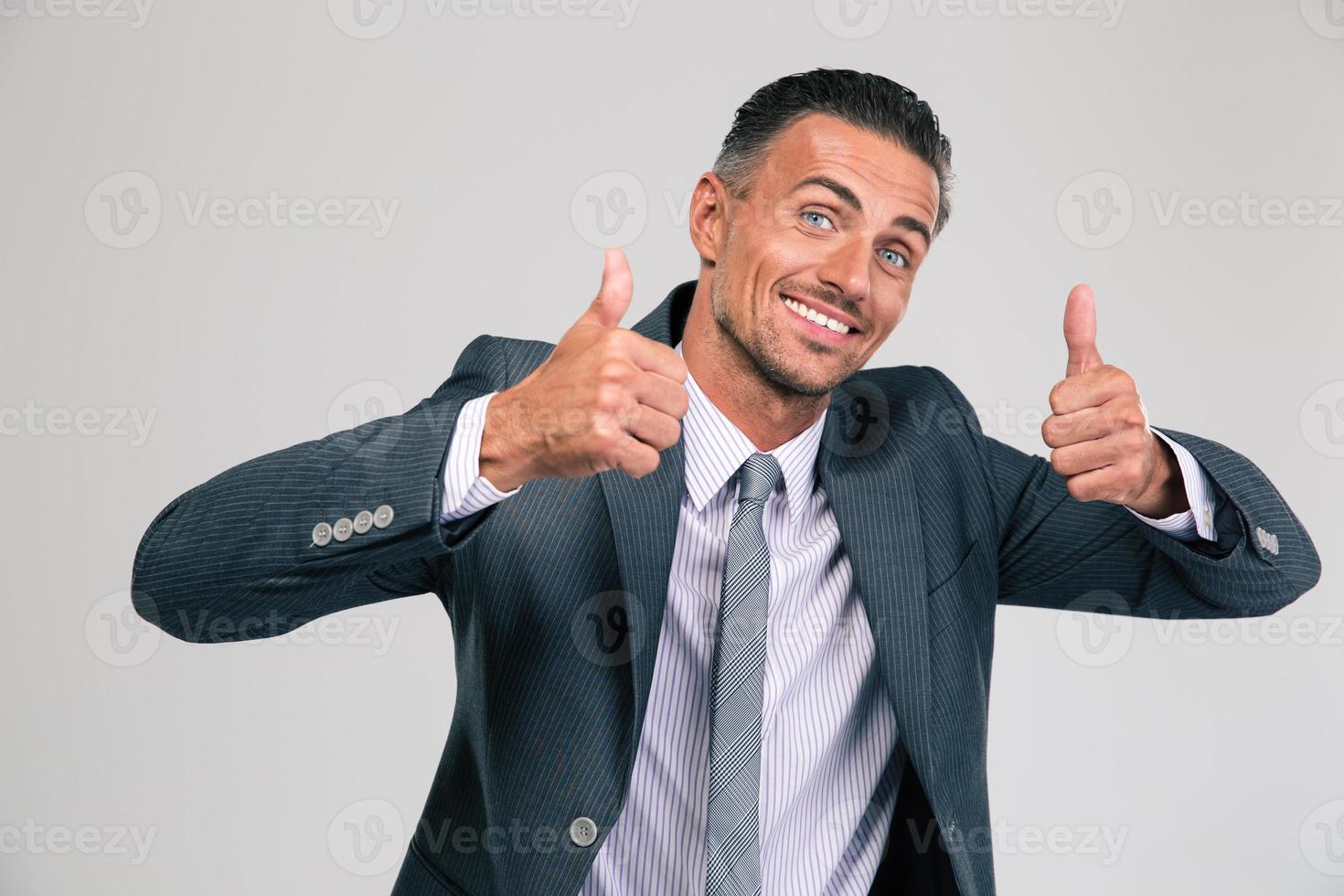 Funny man showing thumbs up photo