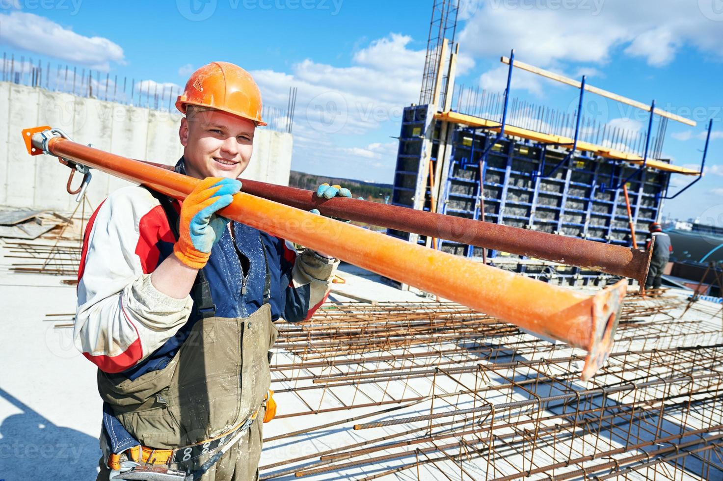 builder worker at construction site photo