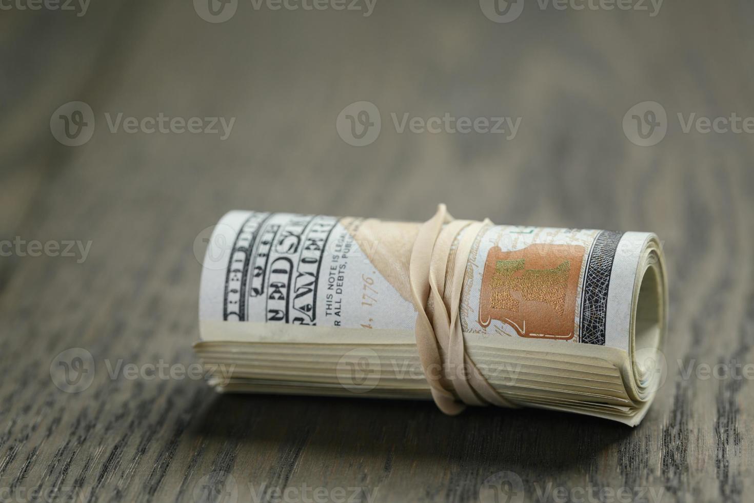 Closeup Of Fifty Dollar Bills On Wooden Table. Fifty Dollar Stock