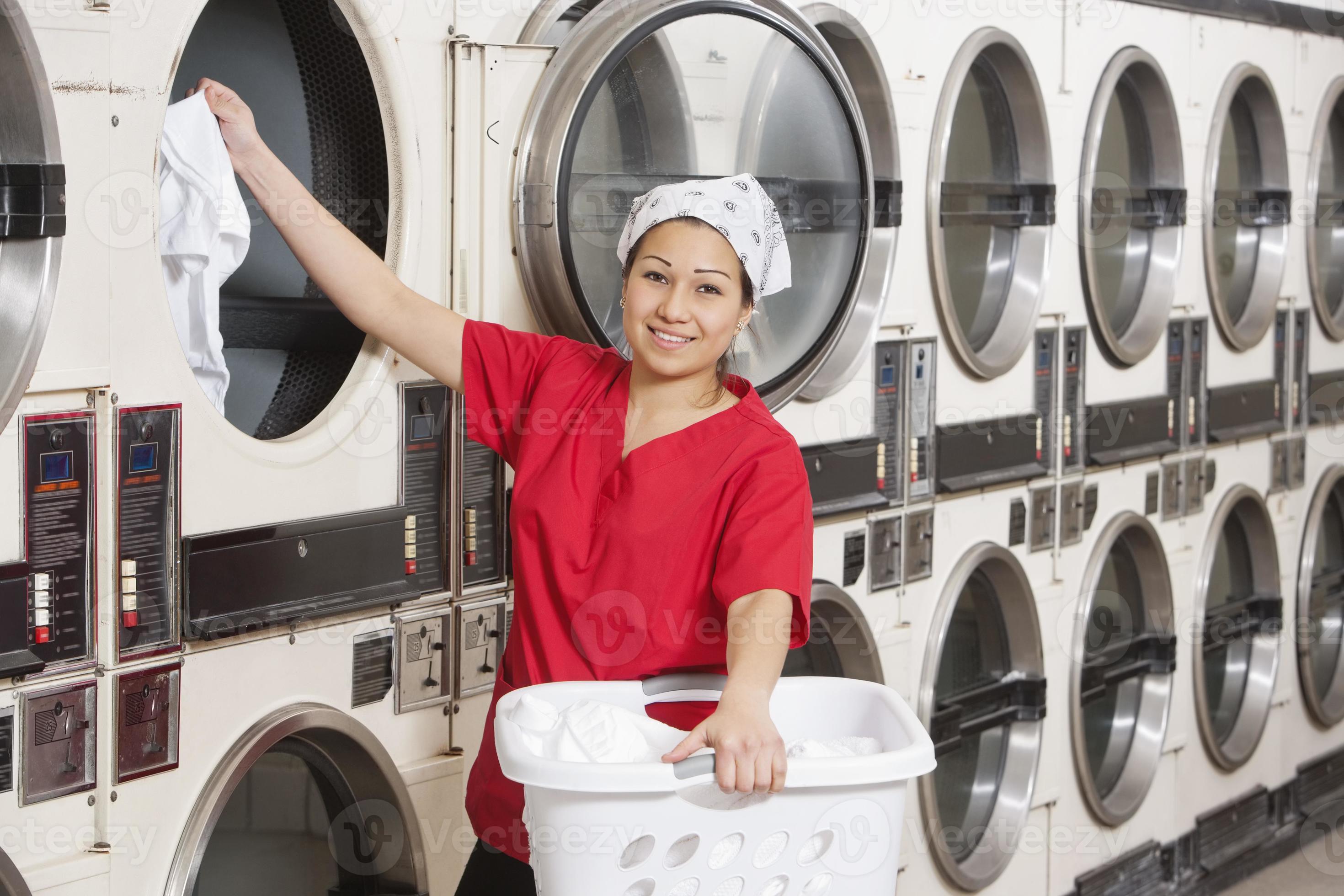 Happy Laundromat worker 1138374 Stock Photo at Vecteezy