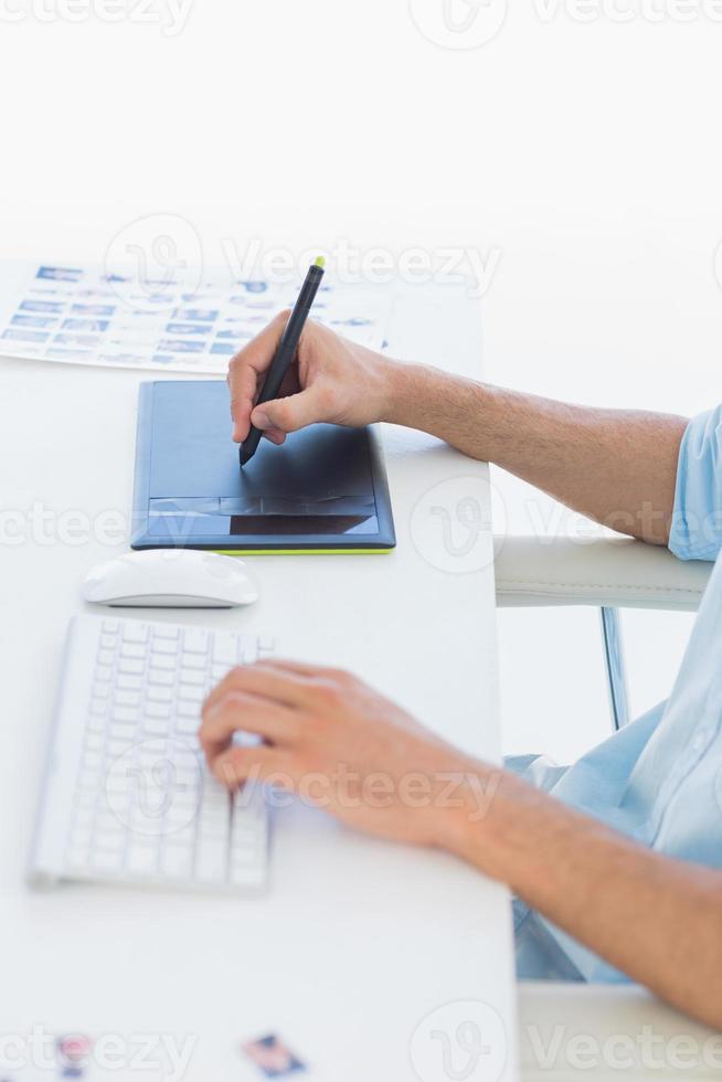 Male photo editor using graphics tablet