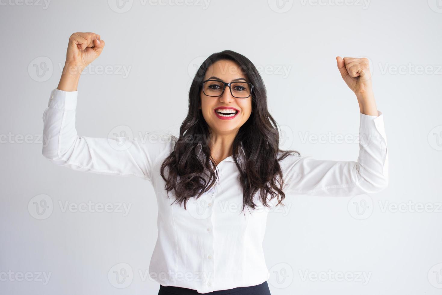 Cheerful Pretty Business Woman Celebrating Success photo