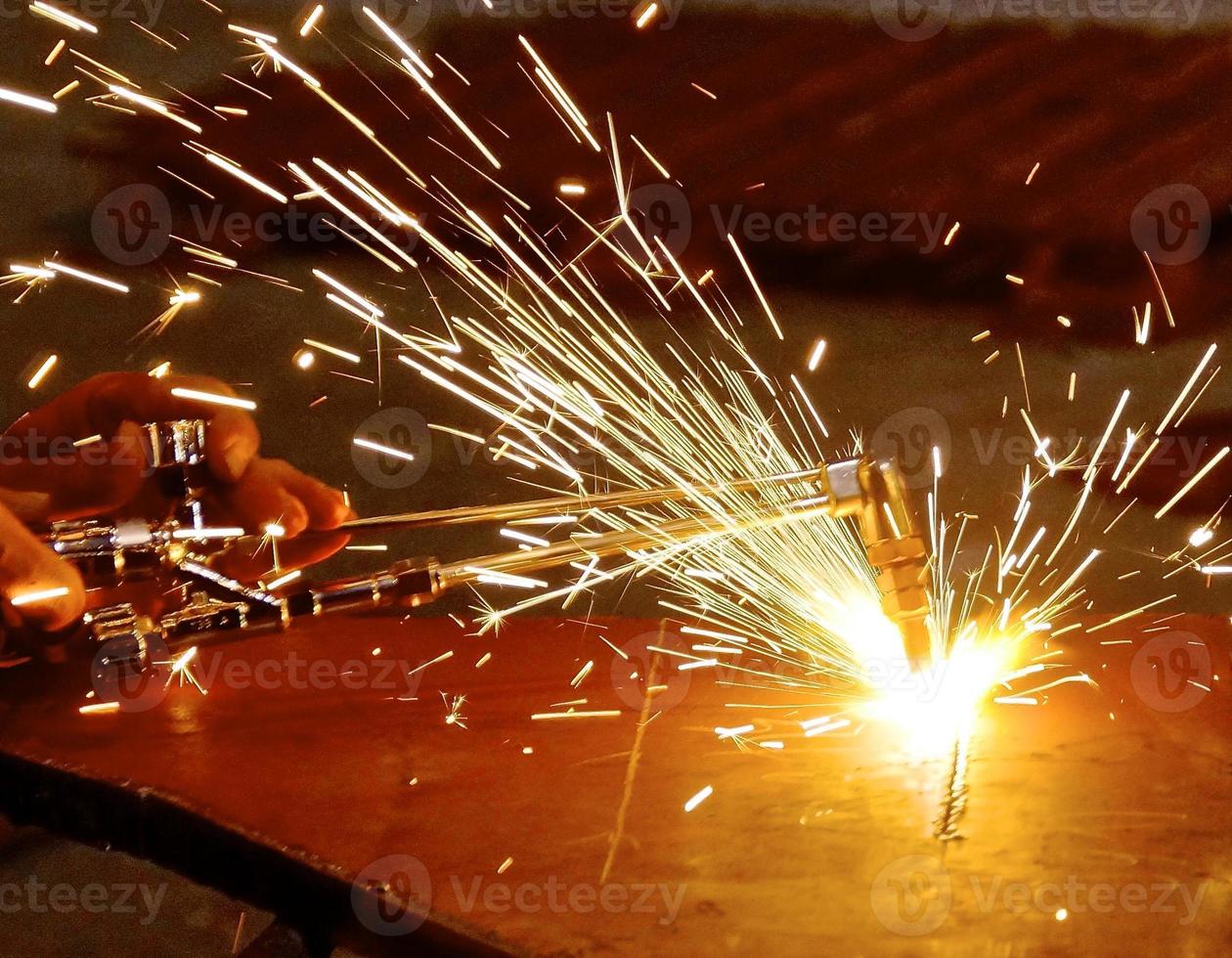 Oxygen and acetylene torch cutting steel with sparks 1178339 Stock