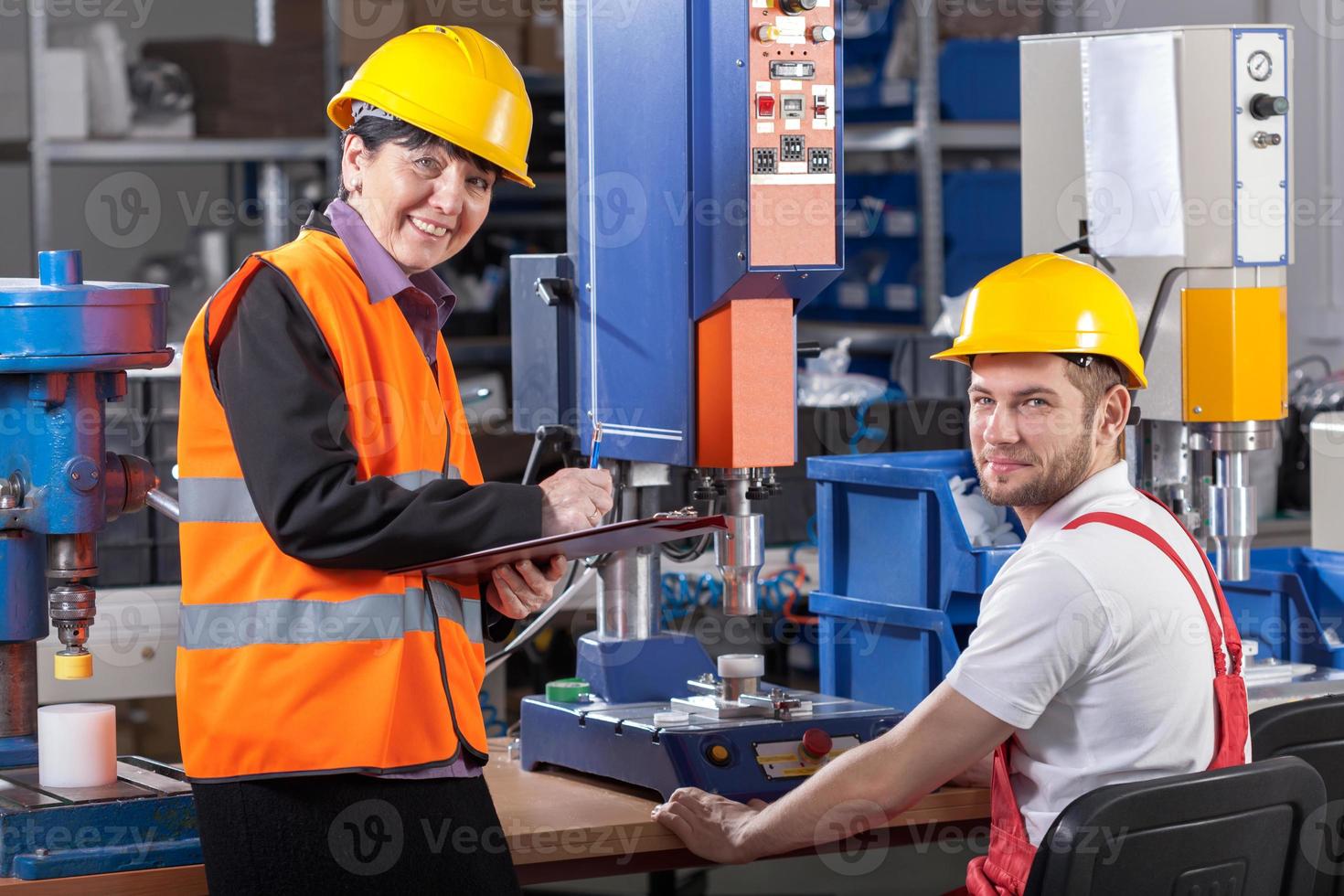 Production worker at workplace and supervisor 1178342 Stock Photo at