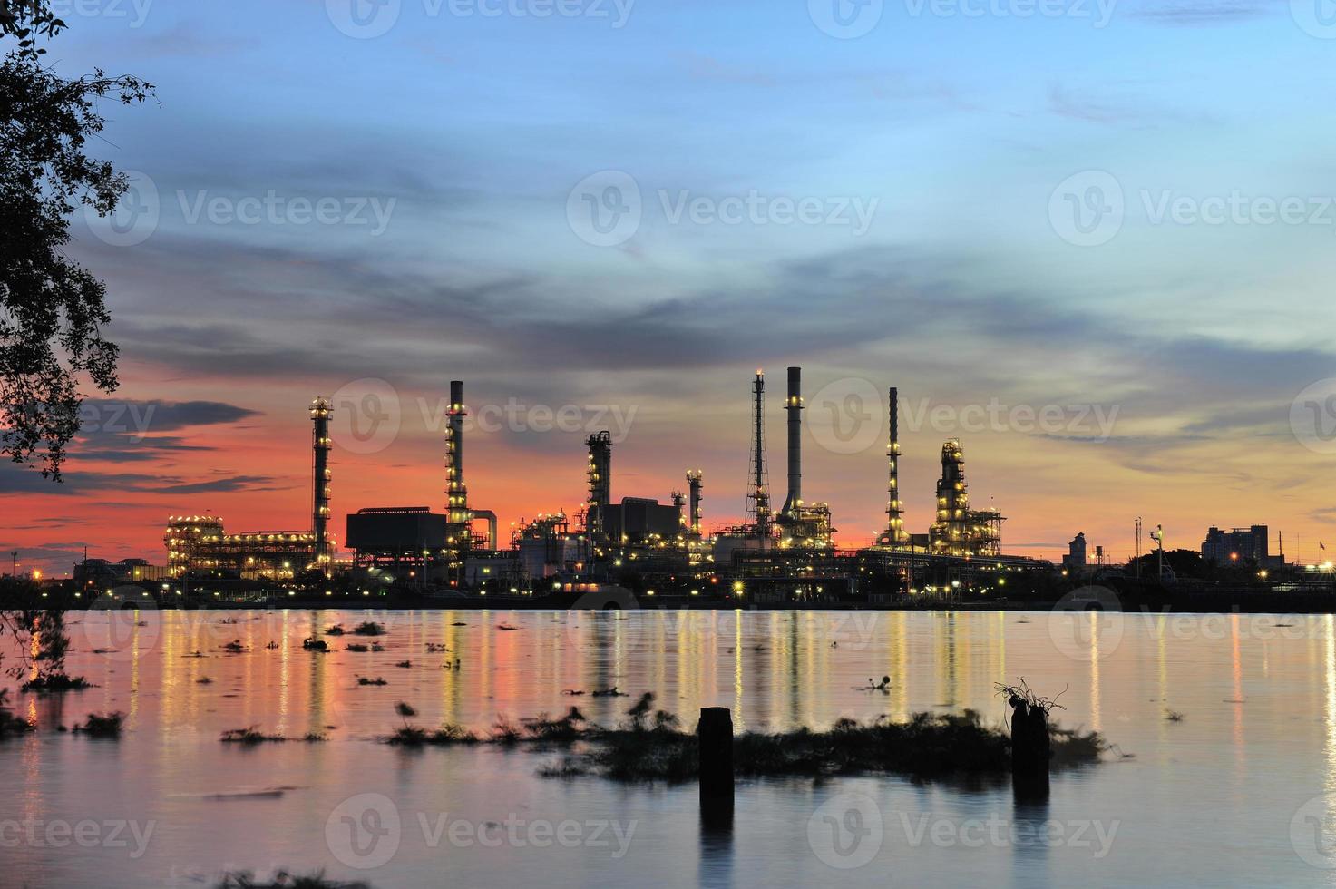 Oil refinery plant at twilight photo