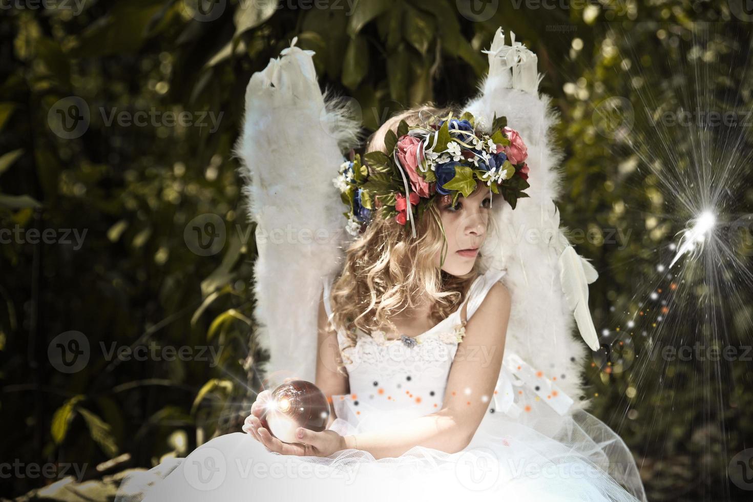 Fairy in an enchanted forest photo