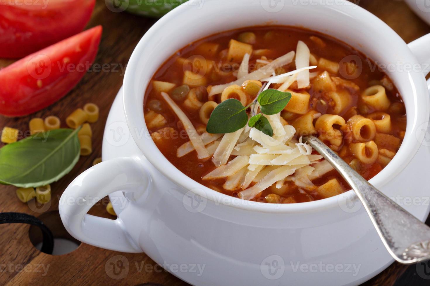 Soup with lentils, pasta and tomatoes photo