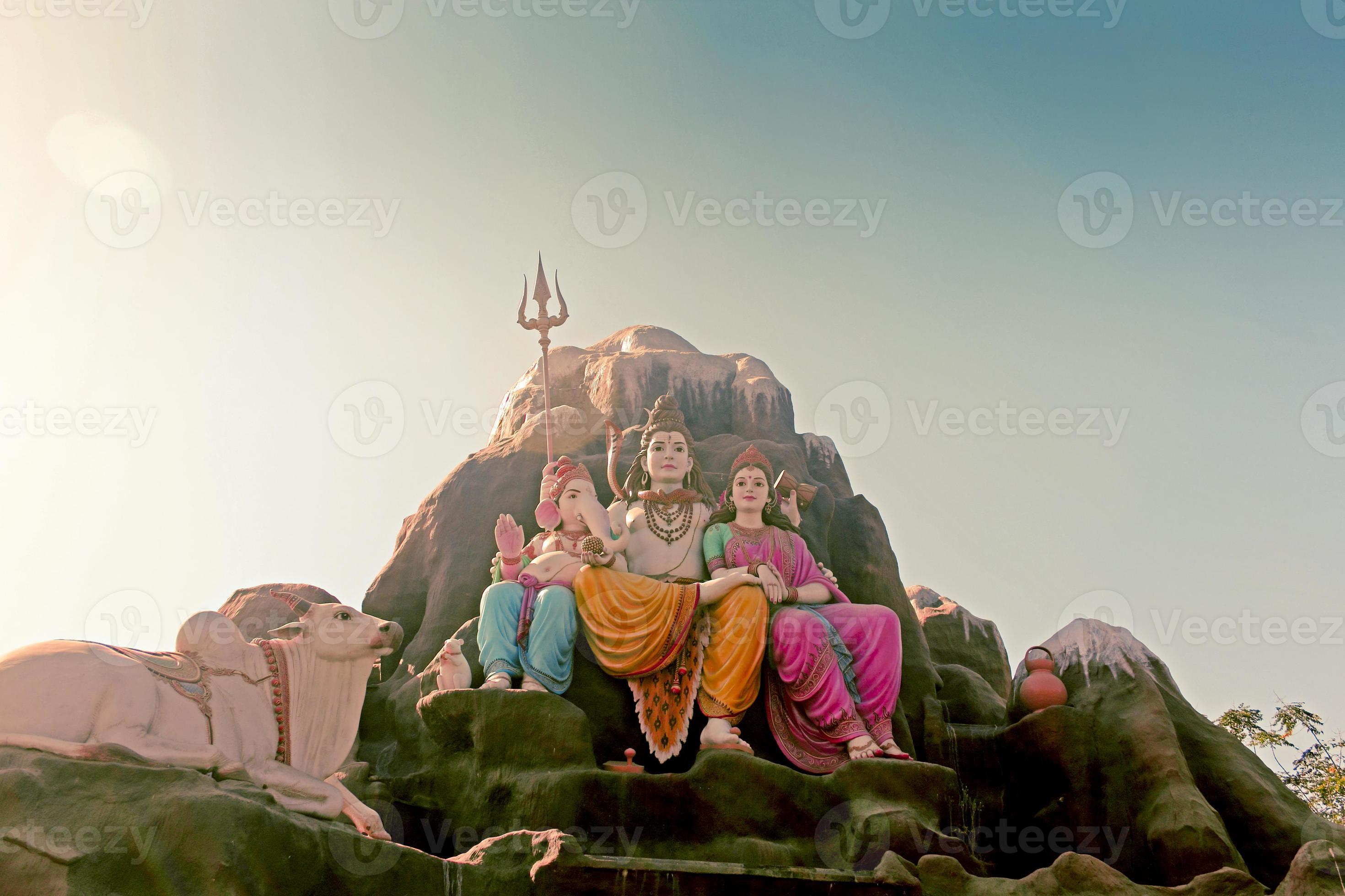 Statue of Lord Shiva-Parvati with Ganesha 1182289 Stock Photo at Vecteezy