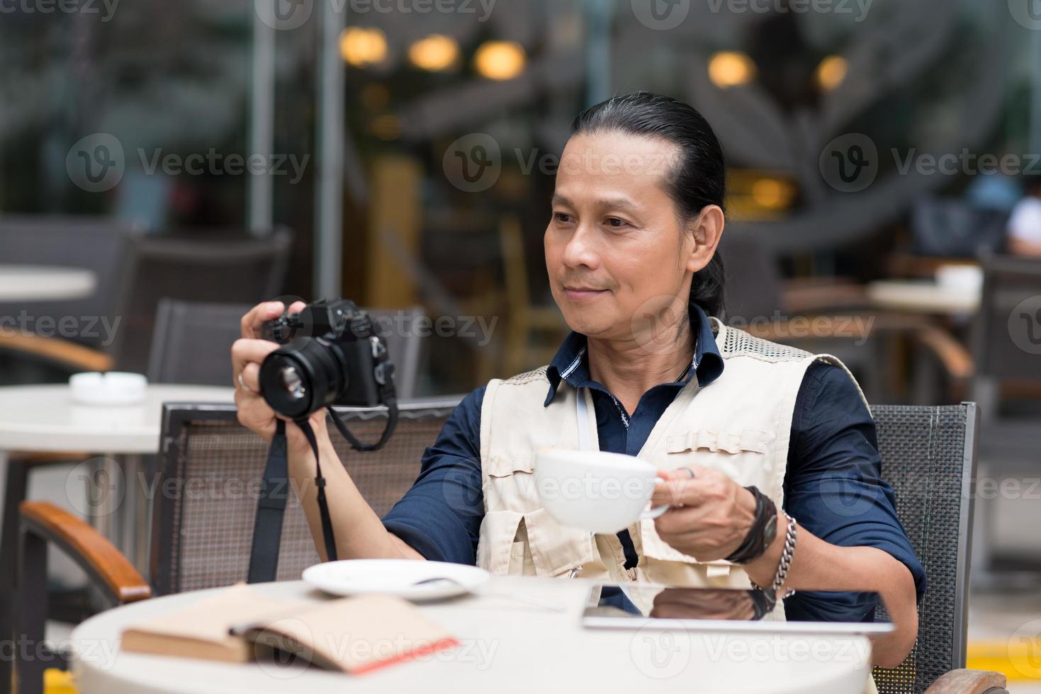 Photographer in a cafe photo