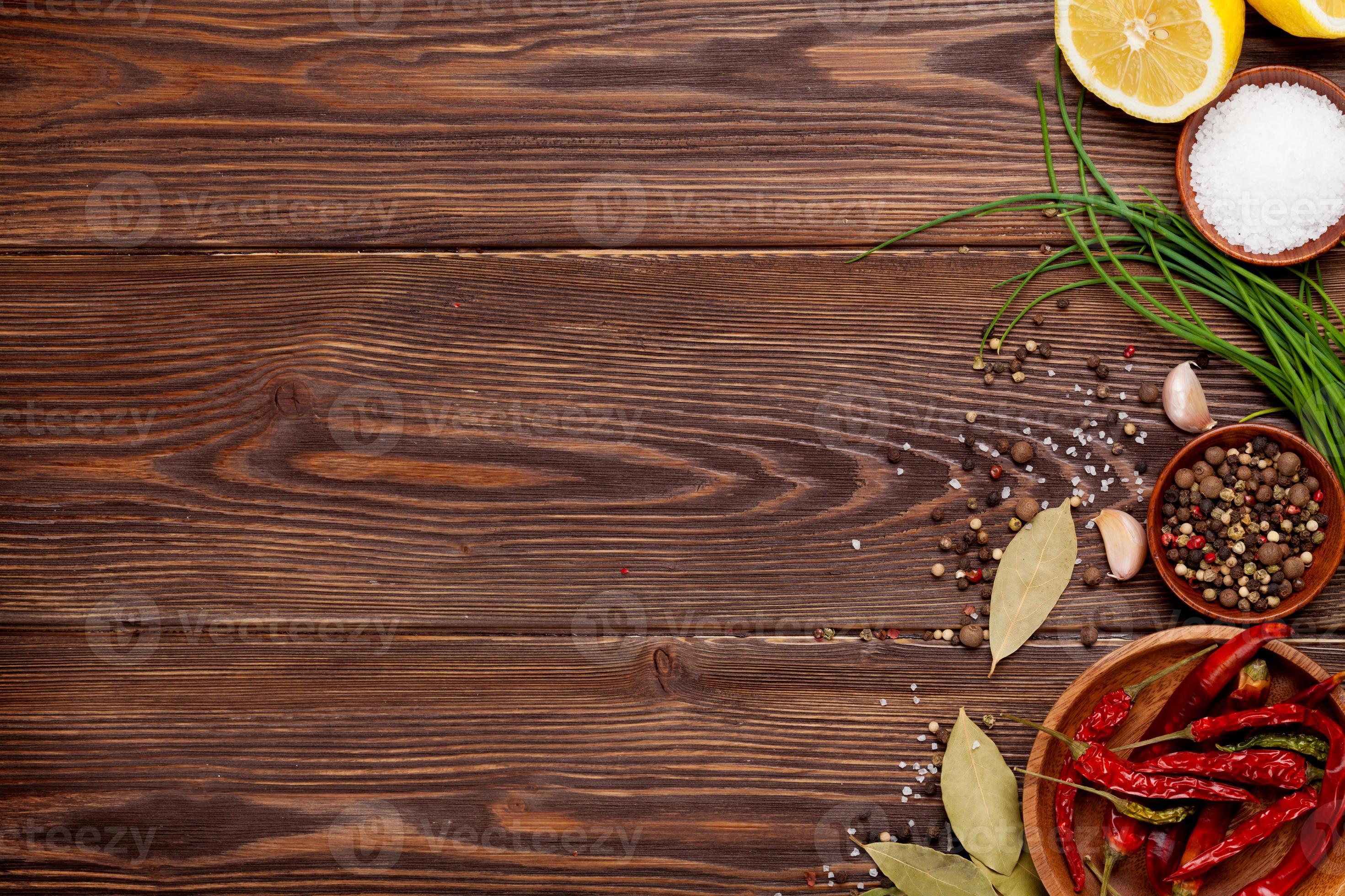 Various spices on wooden background 1184368 Stock Photo at Vecteezy