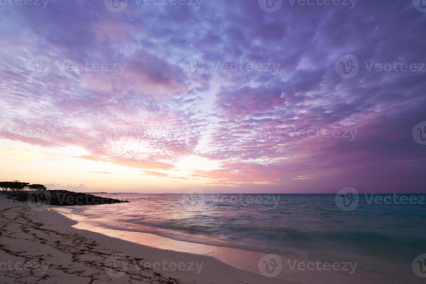 Sunset at Maldivian beach photo