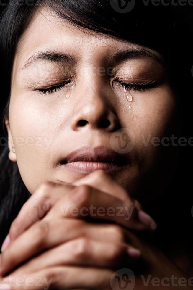 Praying and crying 1185404 Stock Photo at Vecteezy