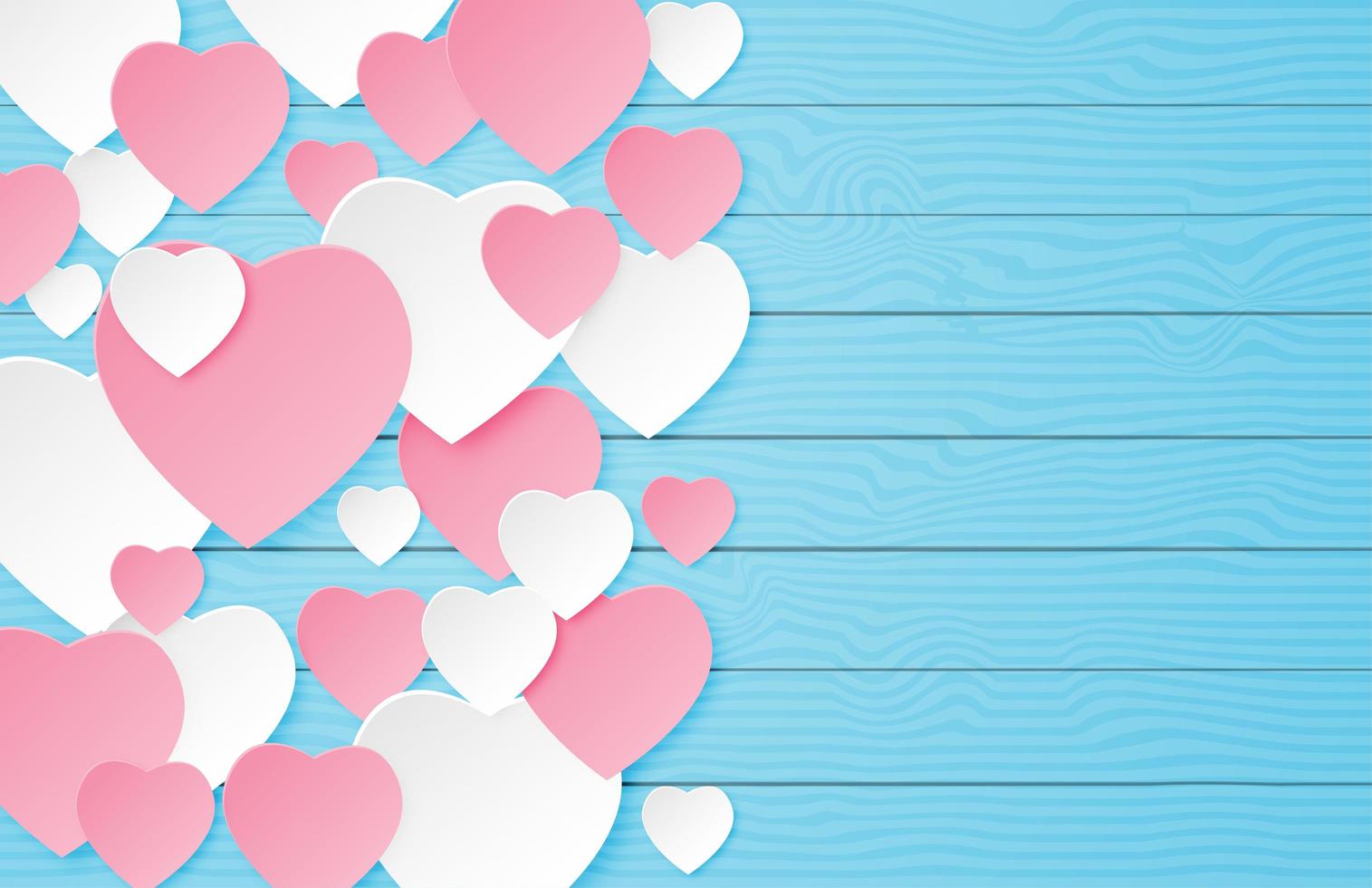 Paper cut hearts layered on blue wood with copyspace vector