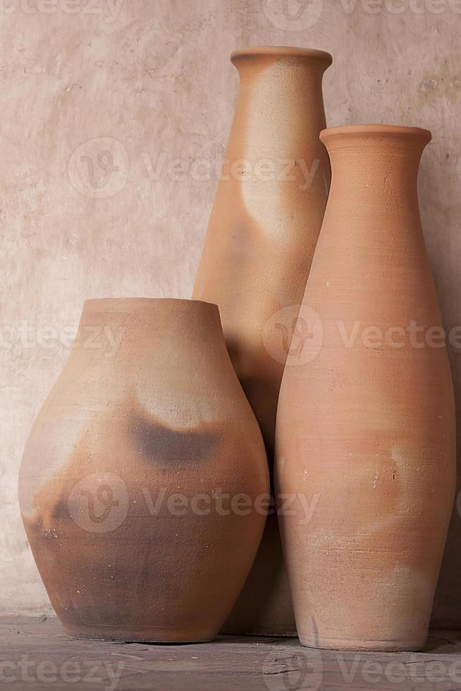Set of three clay pots photo